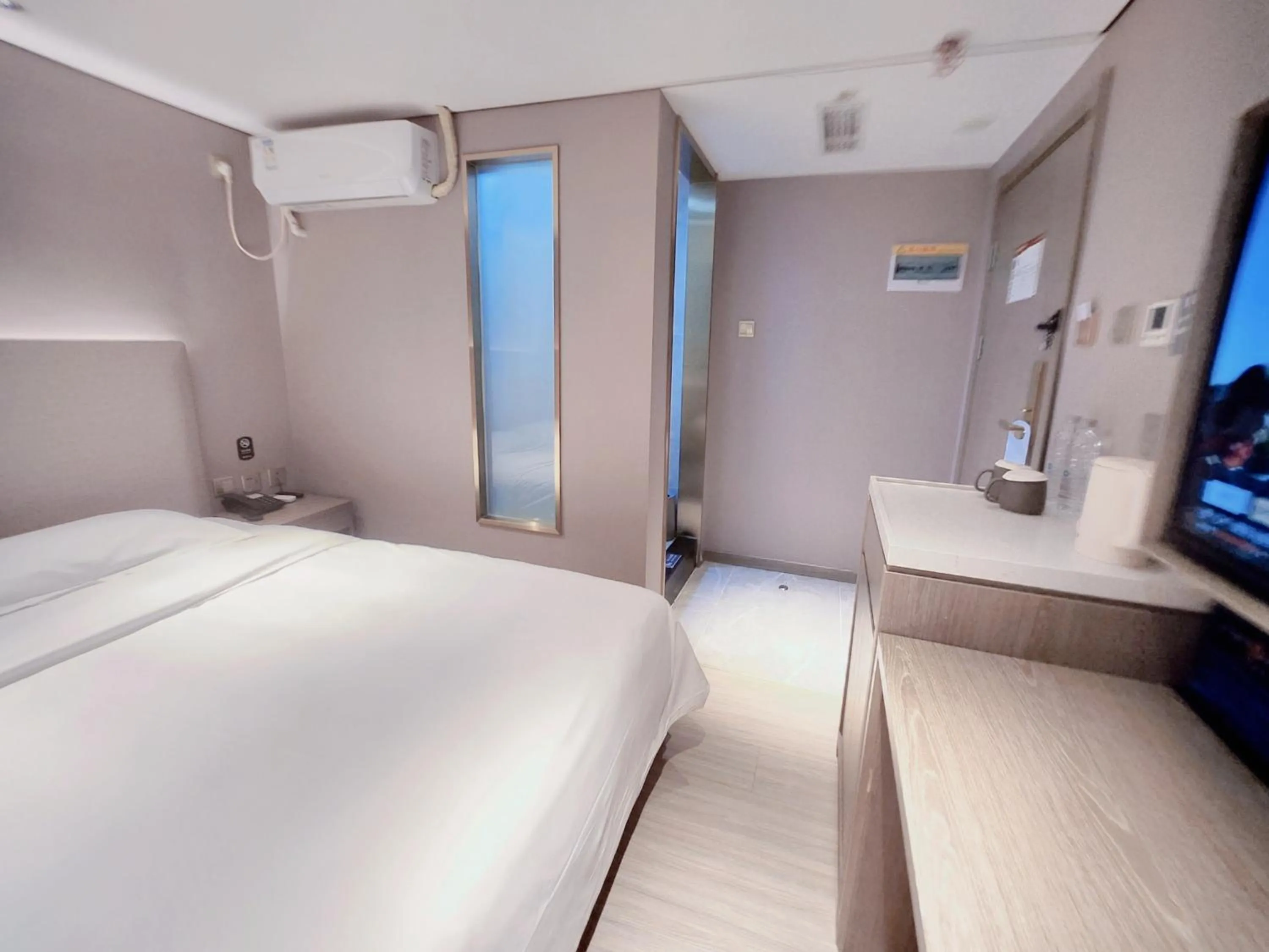 Bed in Hanting Hotel Beijing Fuchengmen Fuwai Hospital