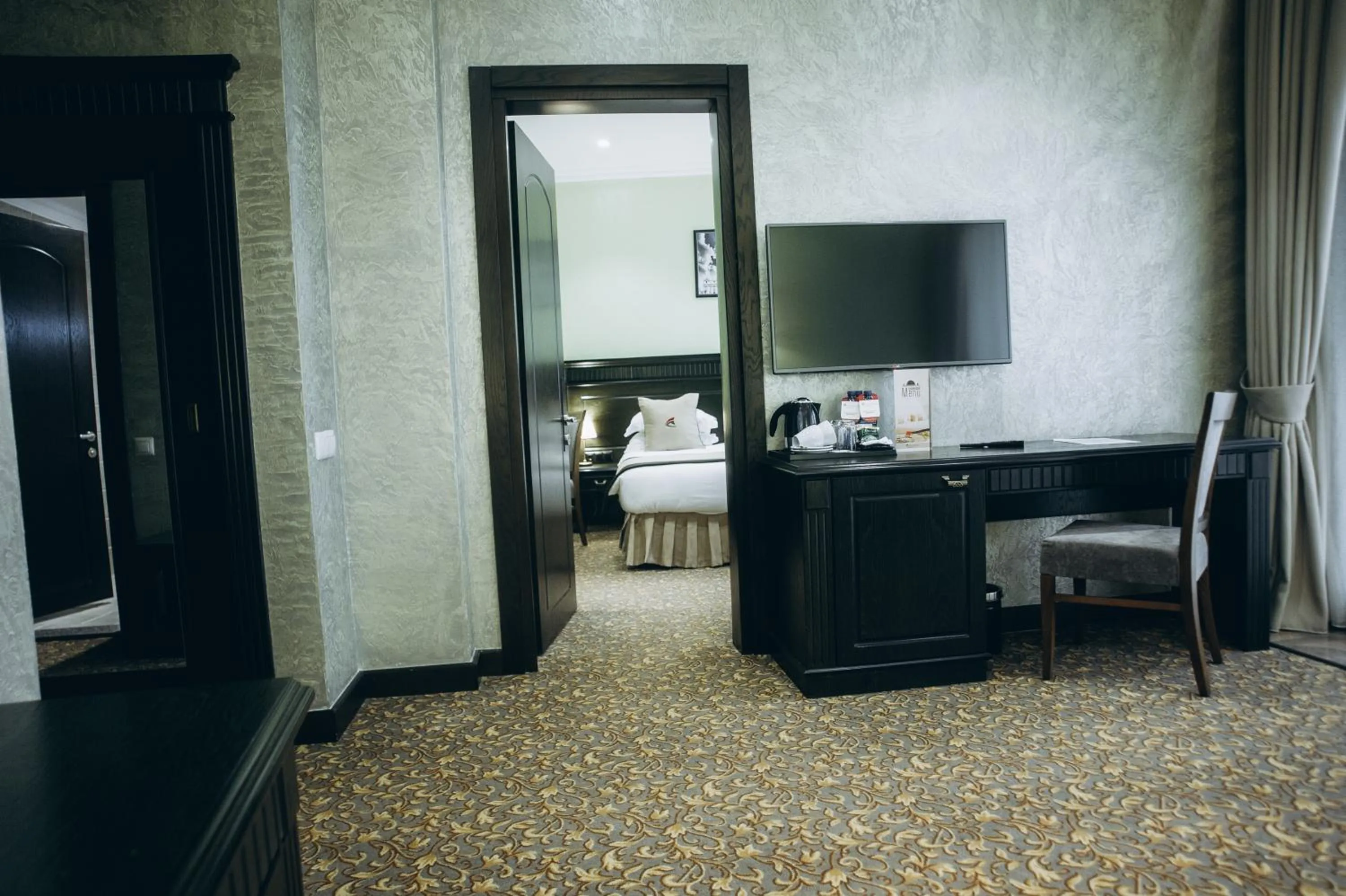 Communal lounge/ TV room in Colosseum Marina Hotel