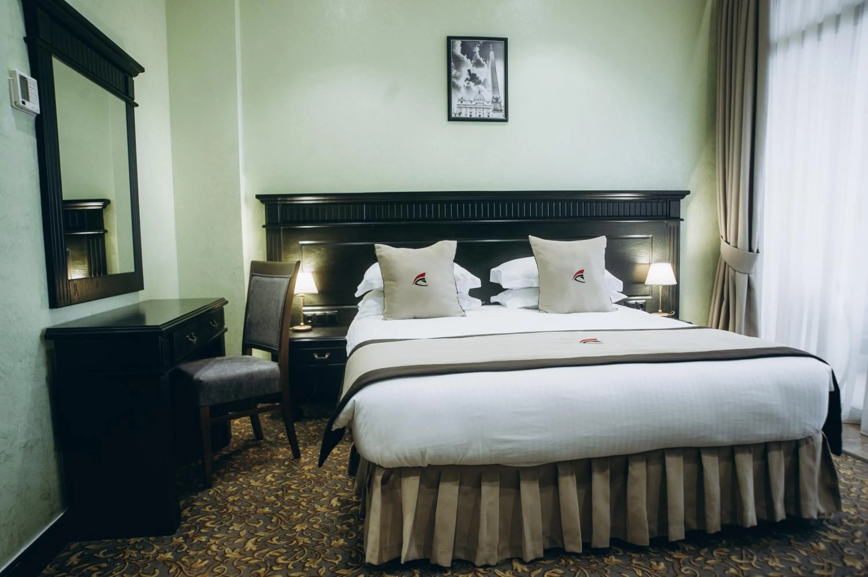 Bed in Colosseum Marina Hotel