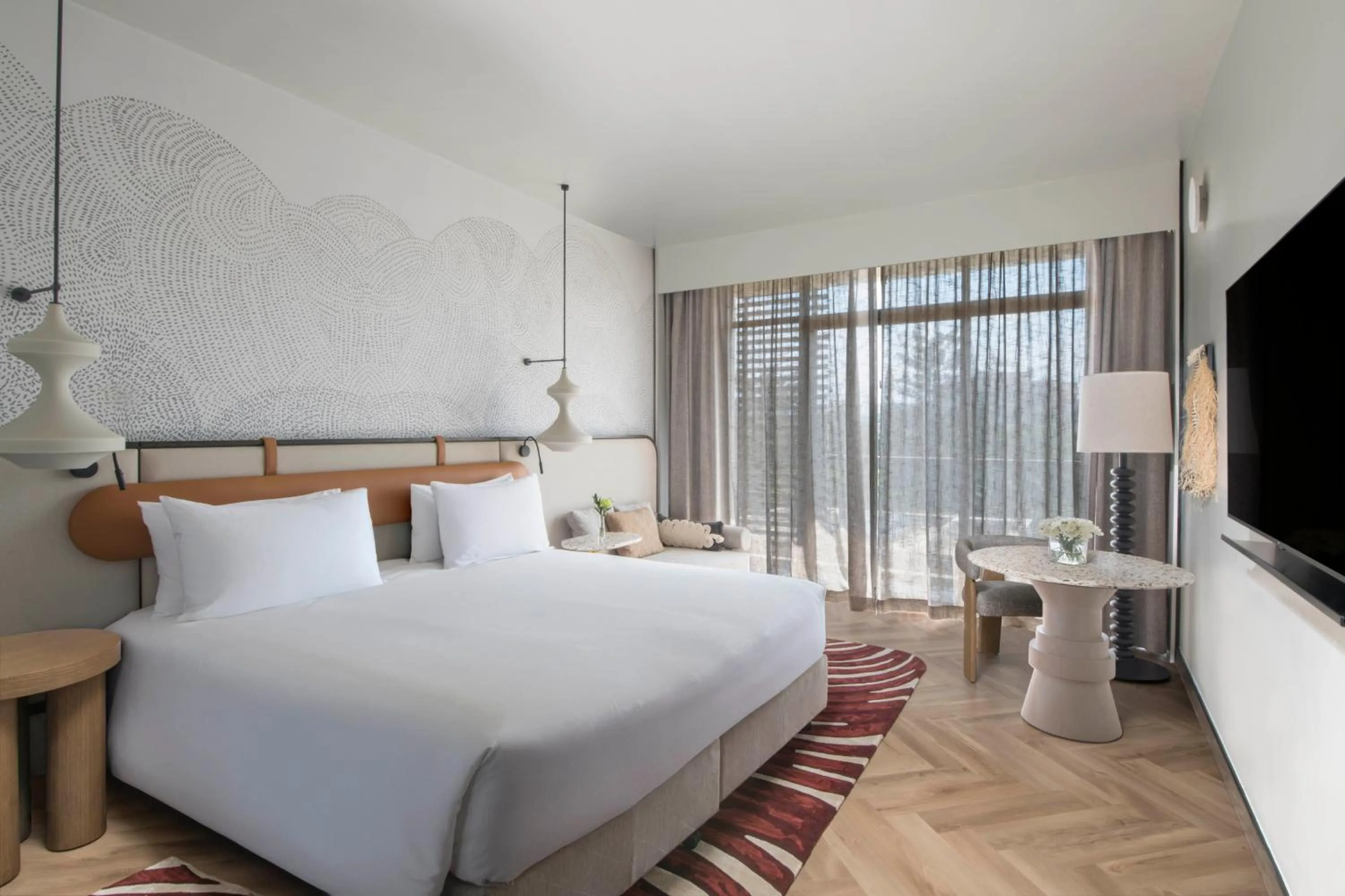 Bed in Mövenpick Kigali