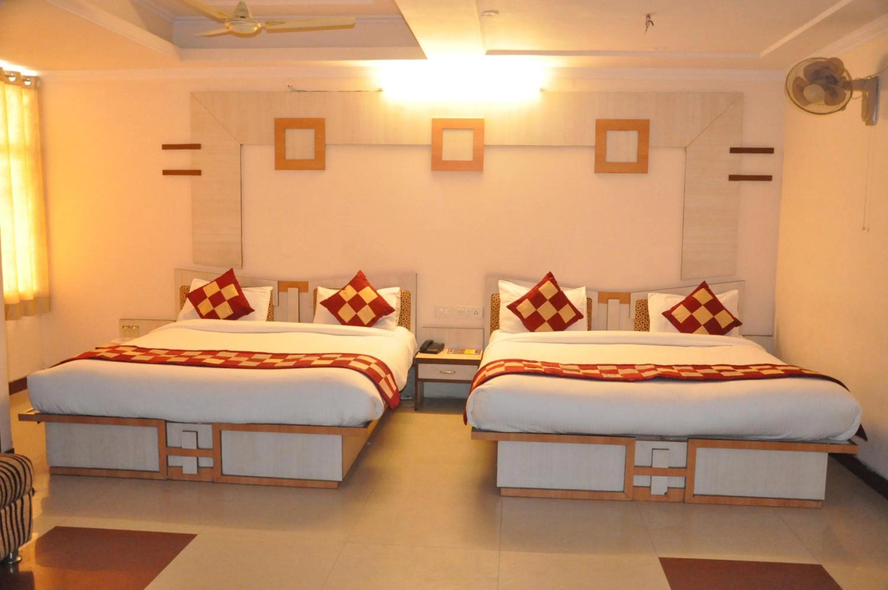 Bed in Hotel Muskan Palace