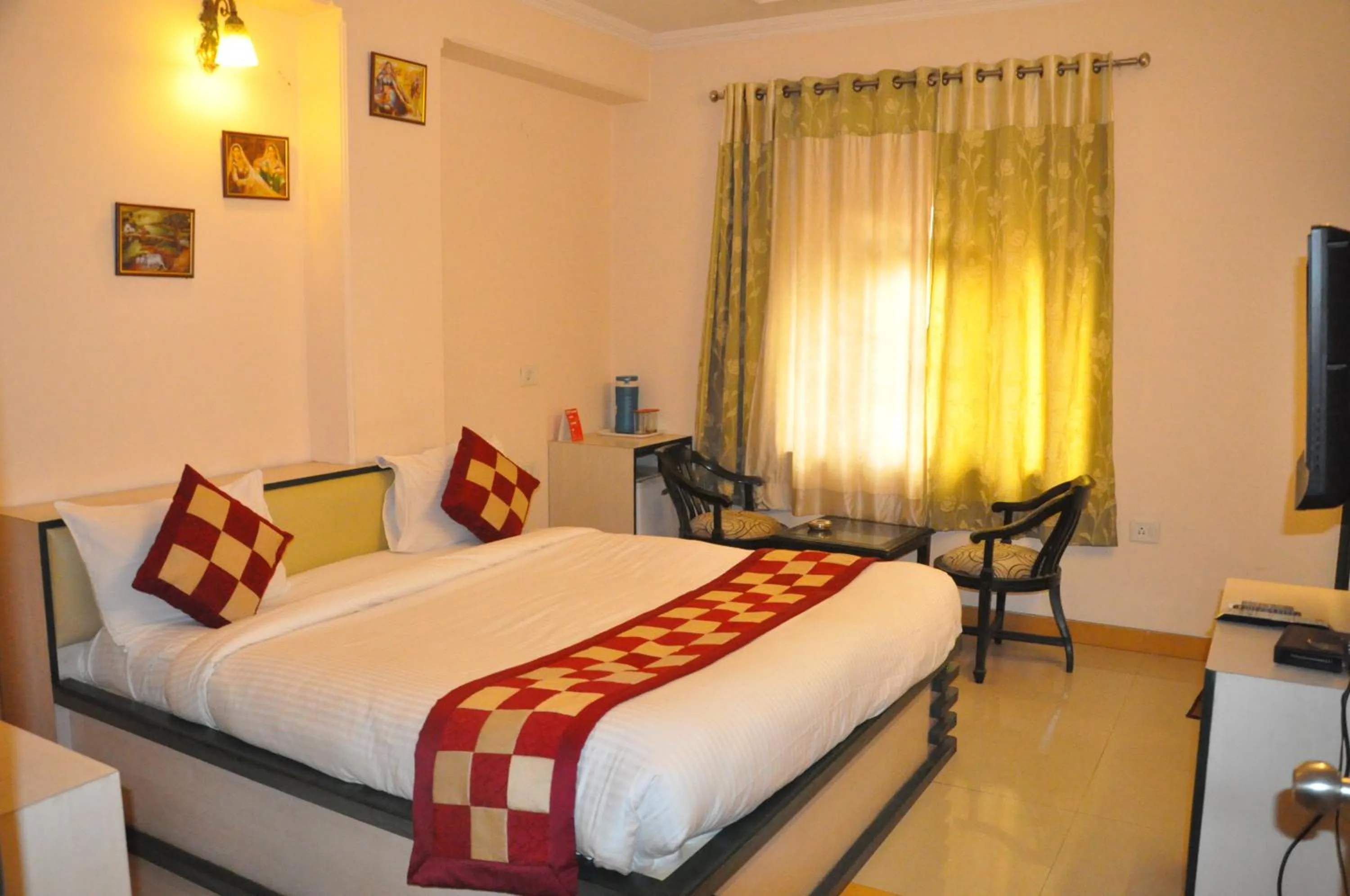 Bed in Hotel Muskan Palace