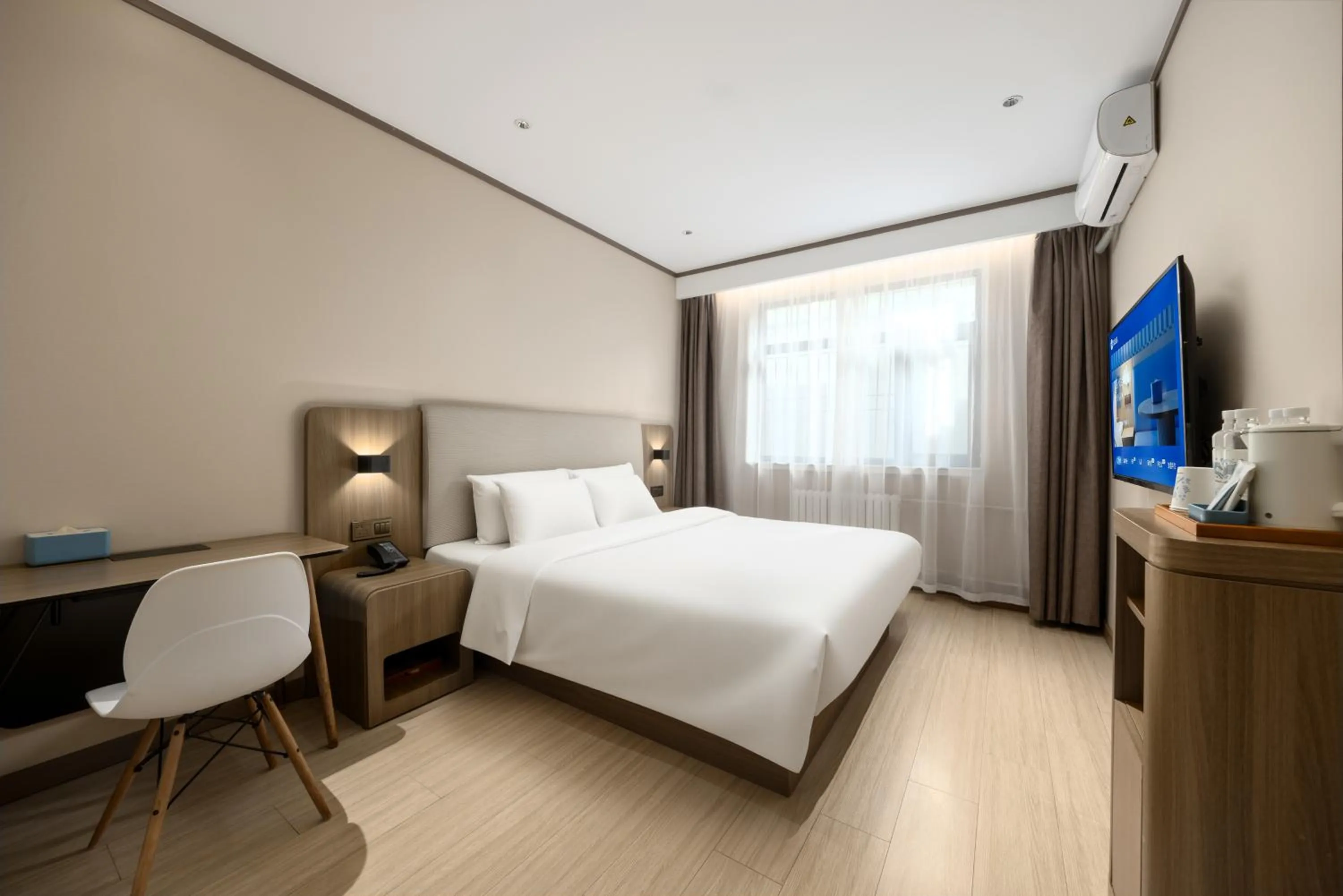 Bed in Hanting Hotel Beijing Deshengmen