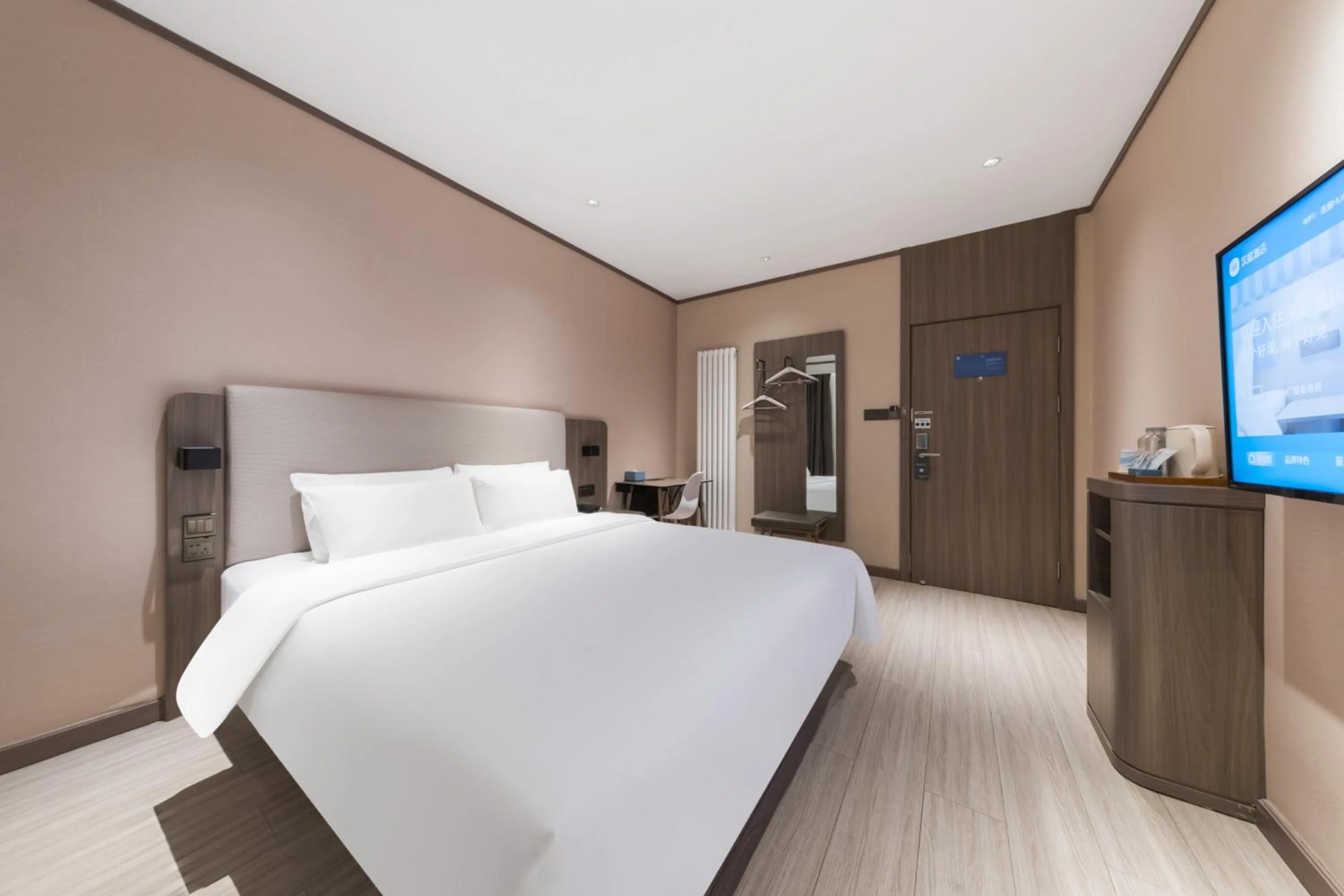 Photo of the whole room, Bed in Hanting Hotel Beijing Deshengmen