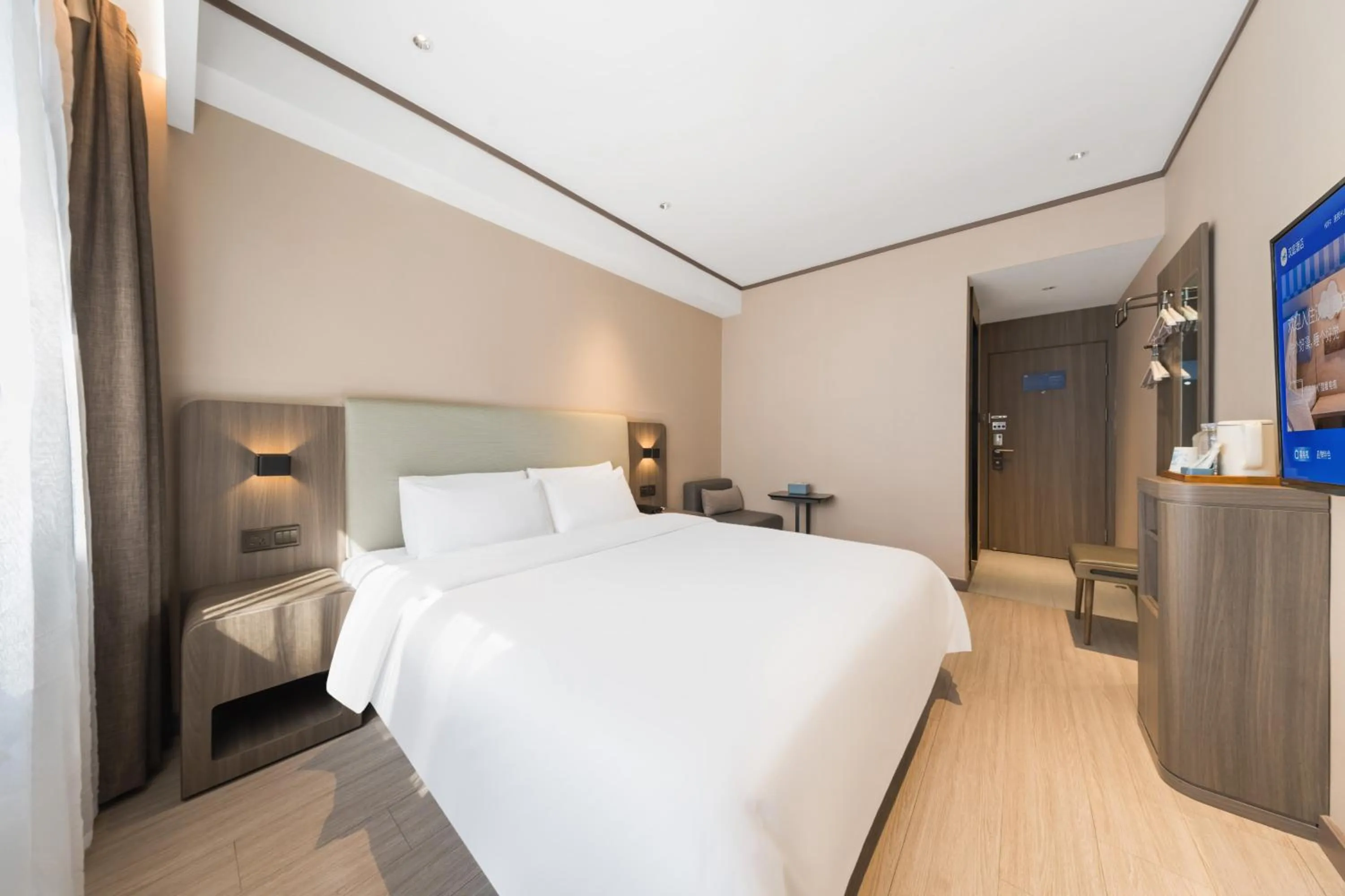 Photo of the whole room, Bed in Hanting Hotel Beijing Deshengmen