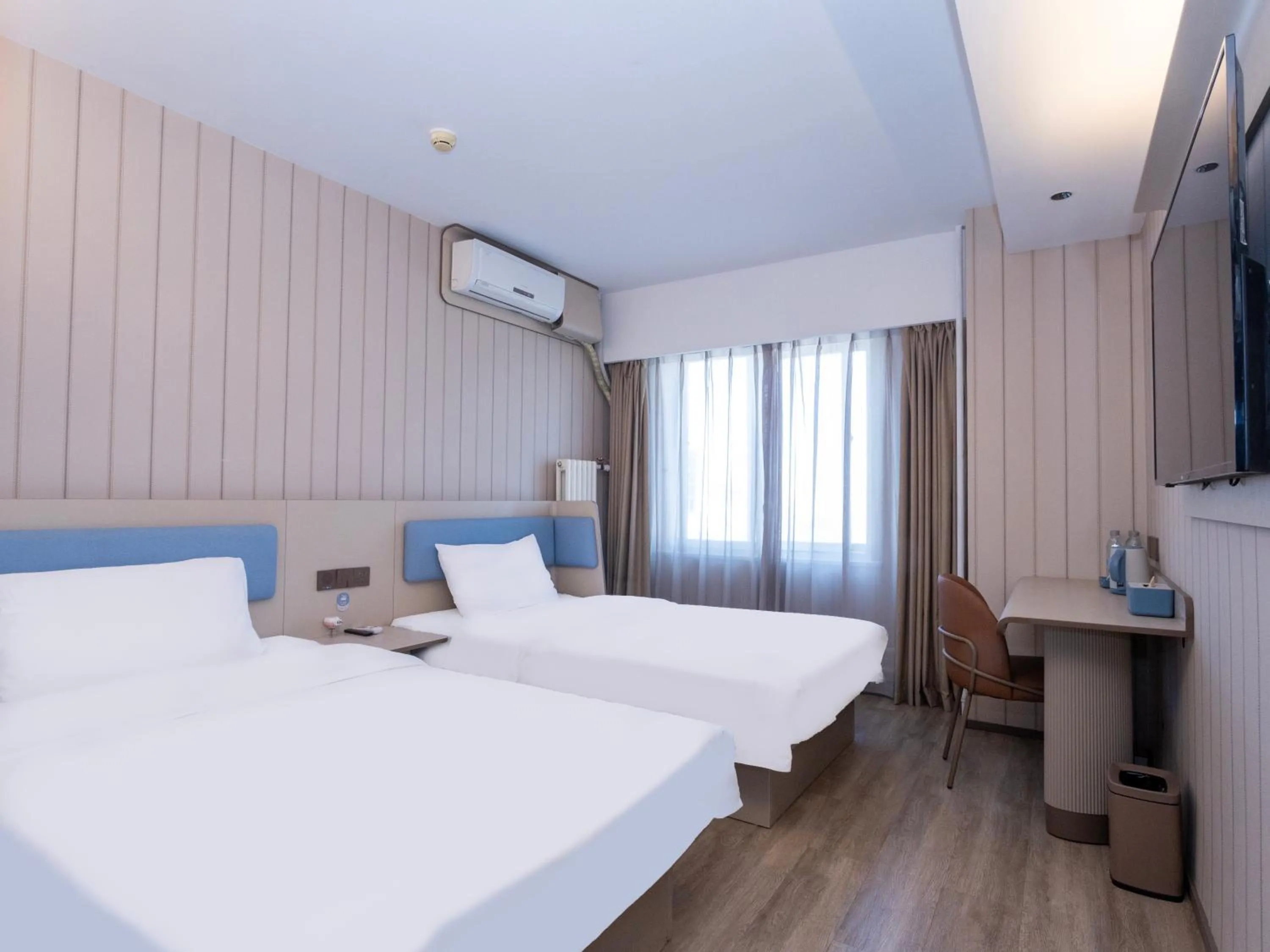 Bed in Hanting Hotel Beijing West Railway Station North Square