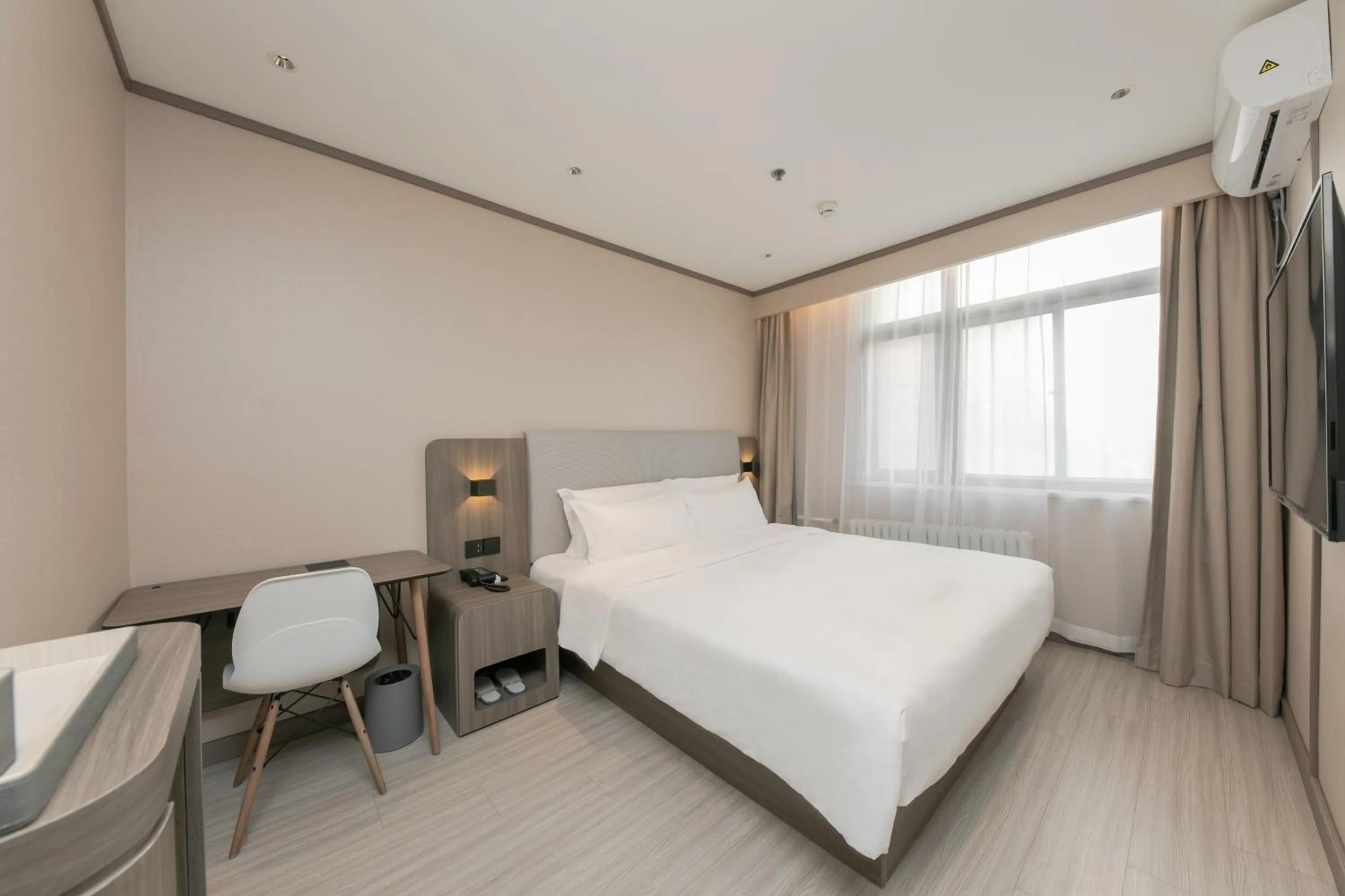 Bed in Hanting Hotel Beijing South Railway Station Gongyi Dongqiao