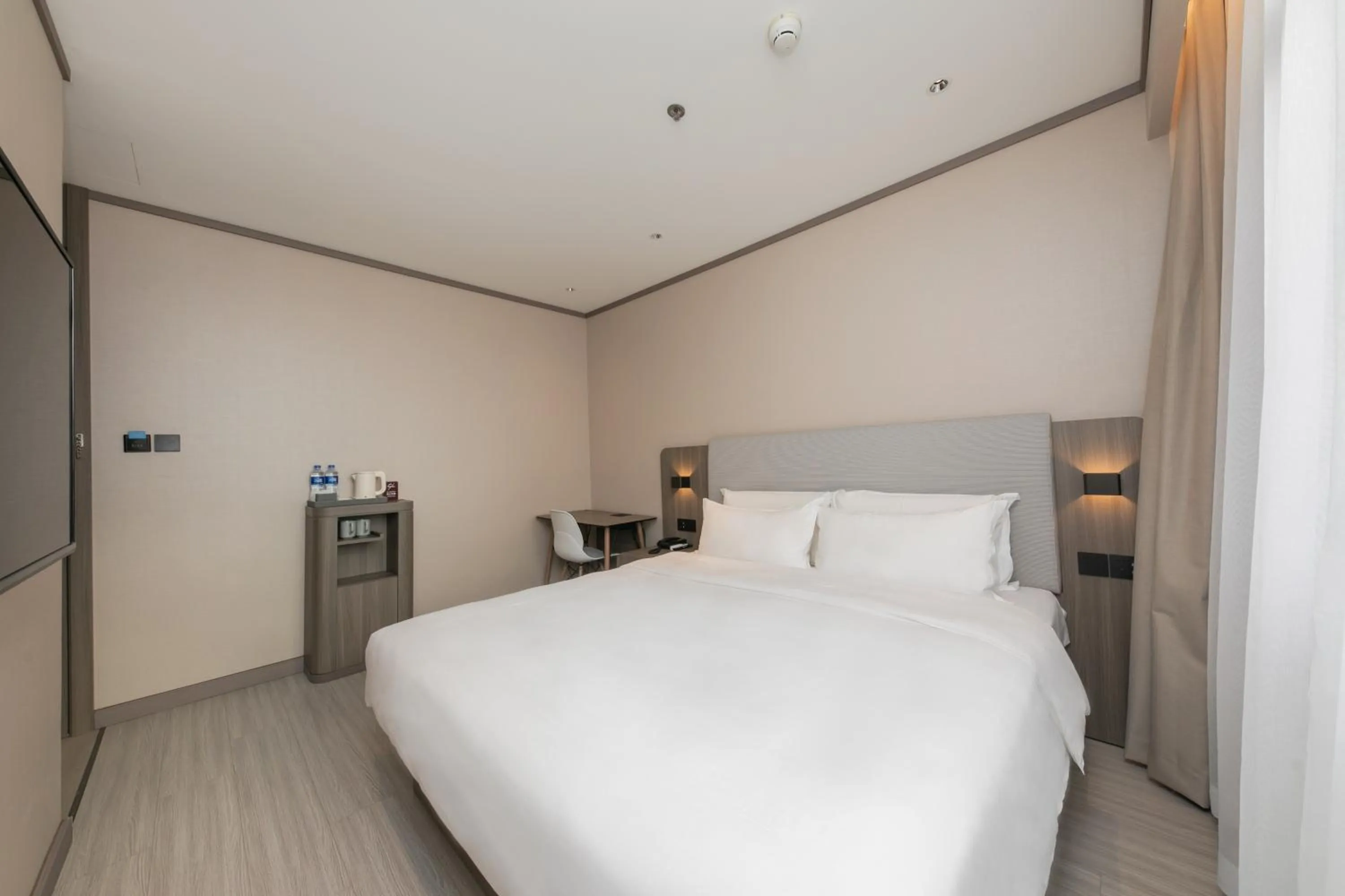 Bed in Hanting Hotel Beijing South Railway Station Gongyi Dongqiao