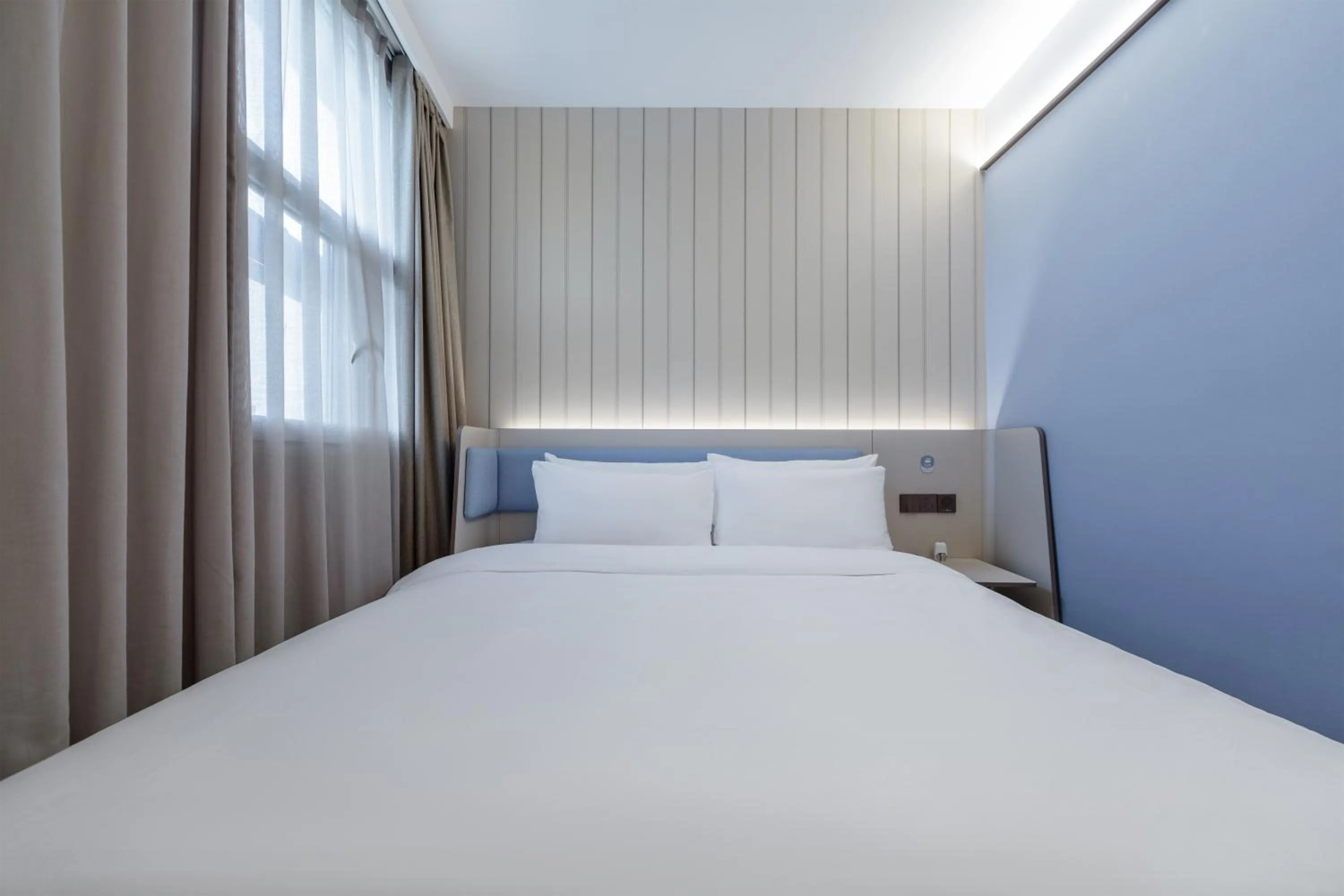 Bed in Hanting Hotel Shanghai Hongqiao Hub Qibao Center