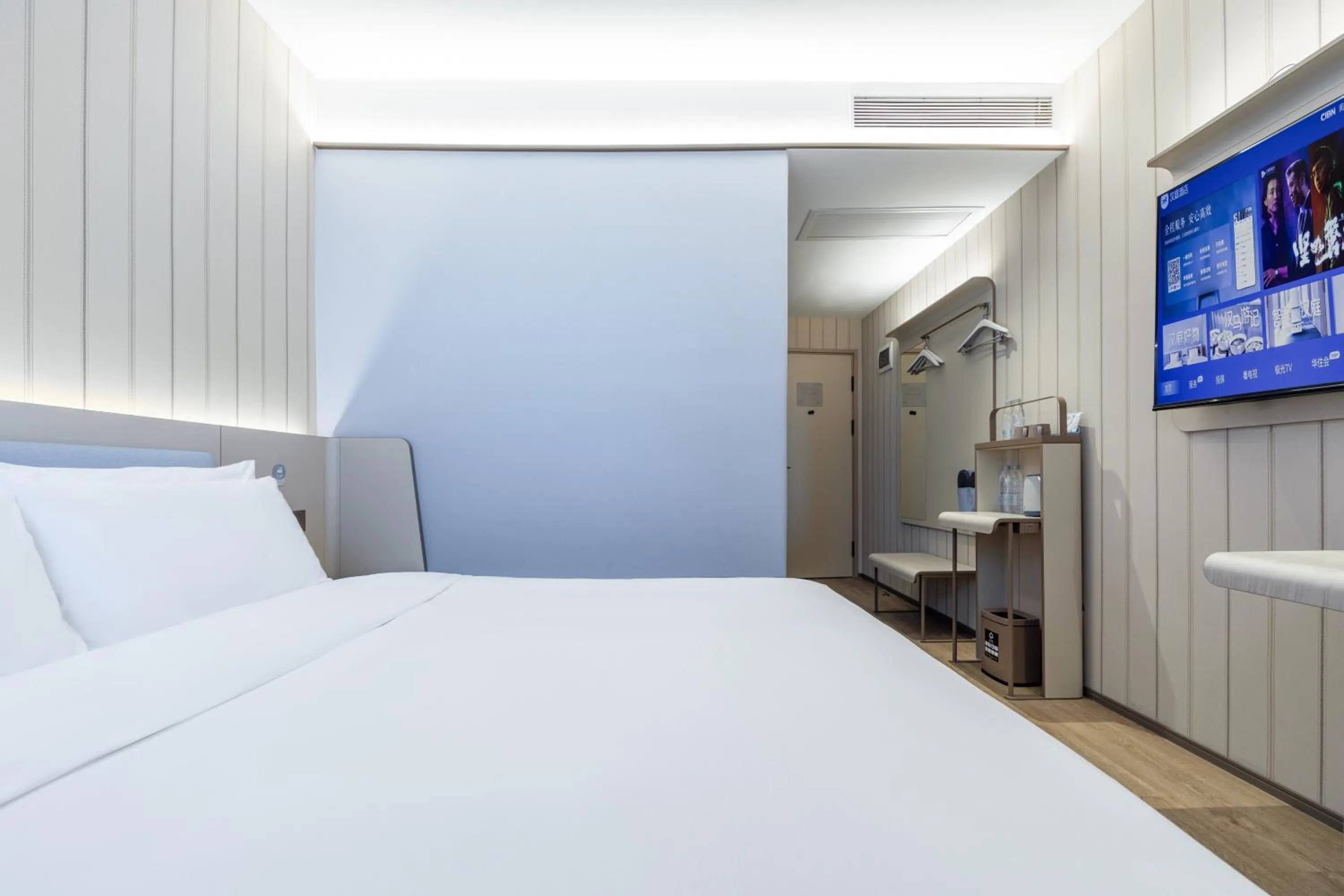 Bed in Hanting Hotel Shanghai Hongqiao Hub Qibao Center