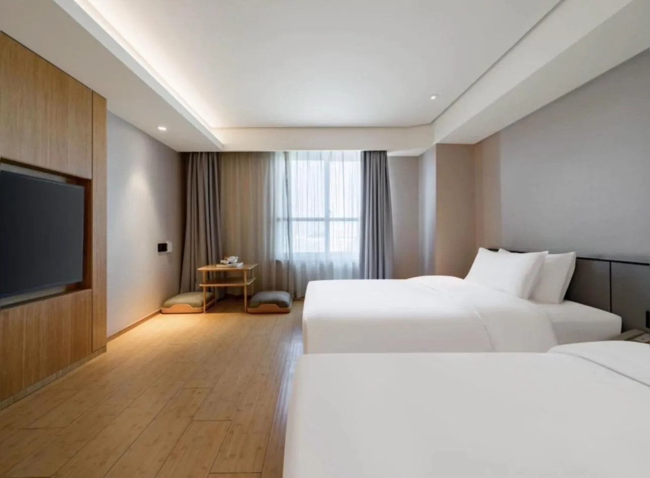 Bed in JI Hotel Shanghai Hongmei South Road Subway Station