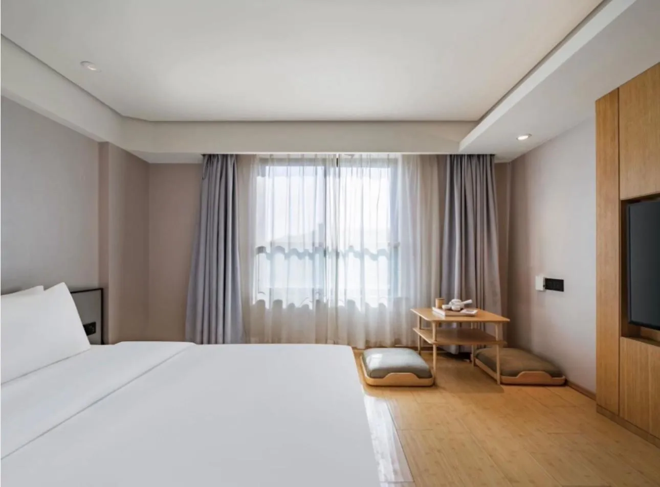 Bed in JI Hotel Shanghai Hongmei South Road Subway Station