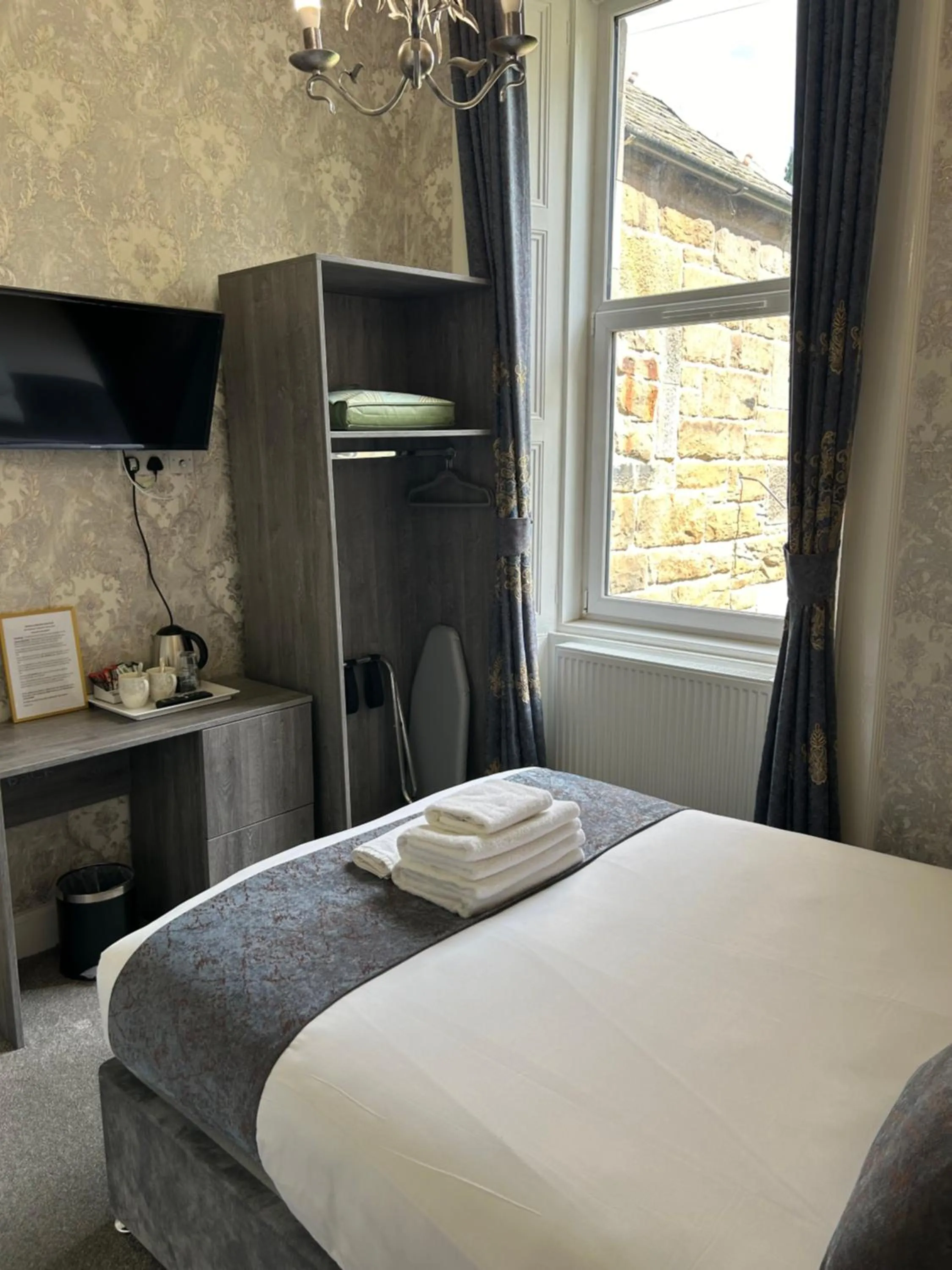 Bed in Arrandale Guest House