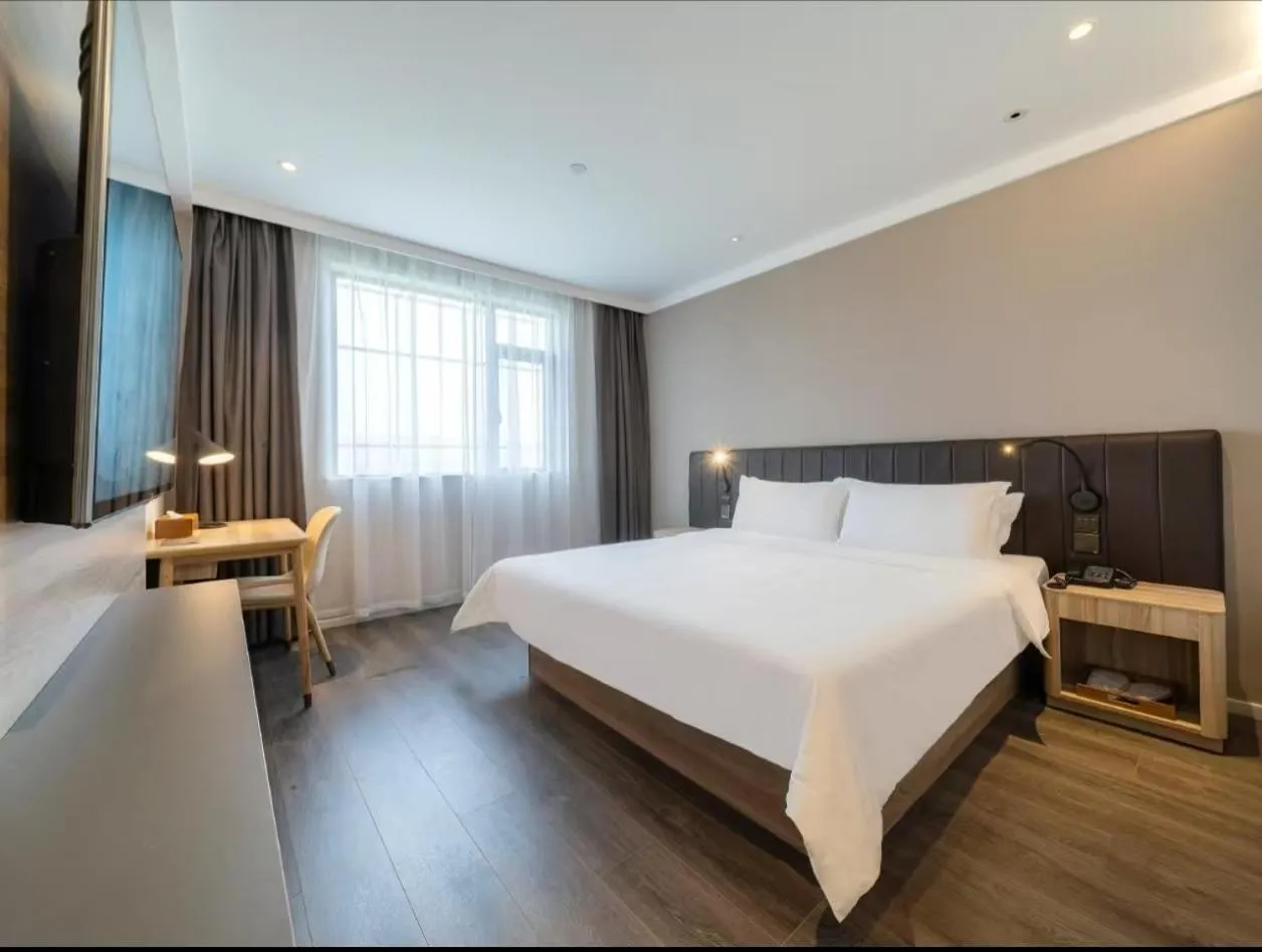 Bed in Hanting Premium Hotel Shanghai Fengxian Sports Center