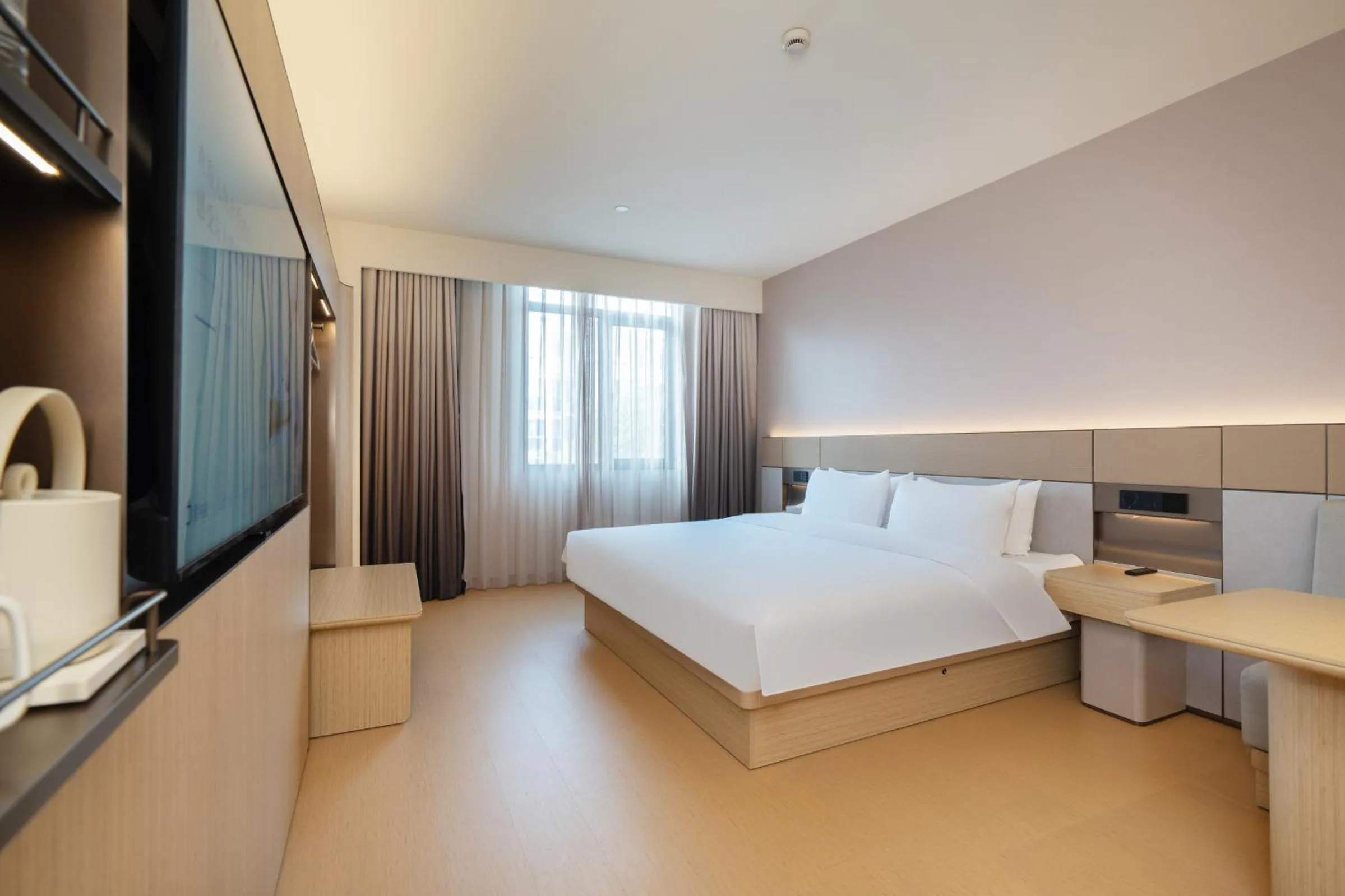 Bed in JI Hotel Shanghai Jiuting Center