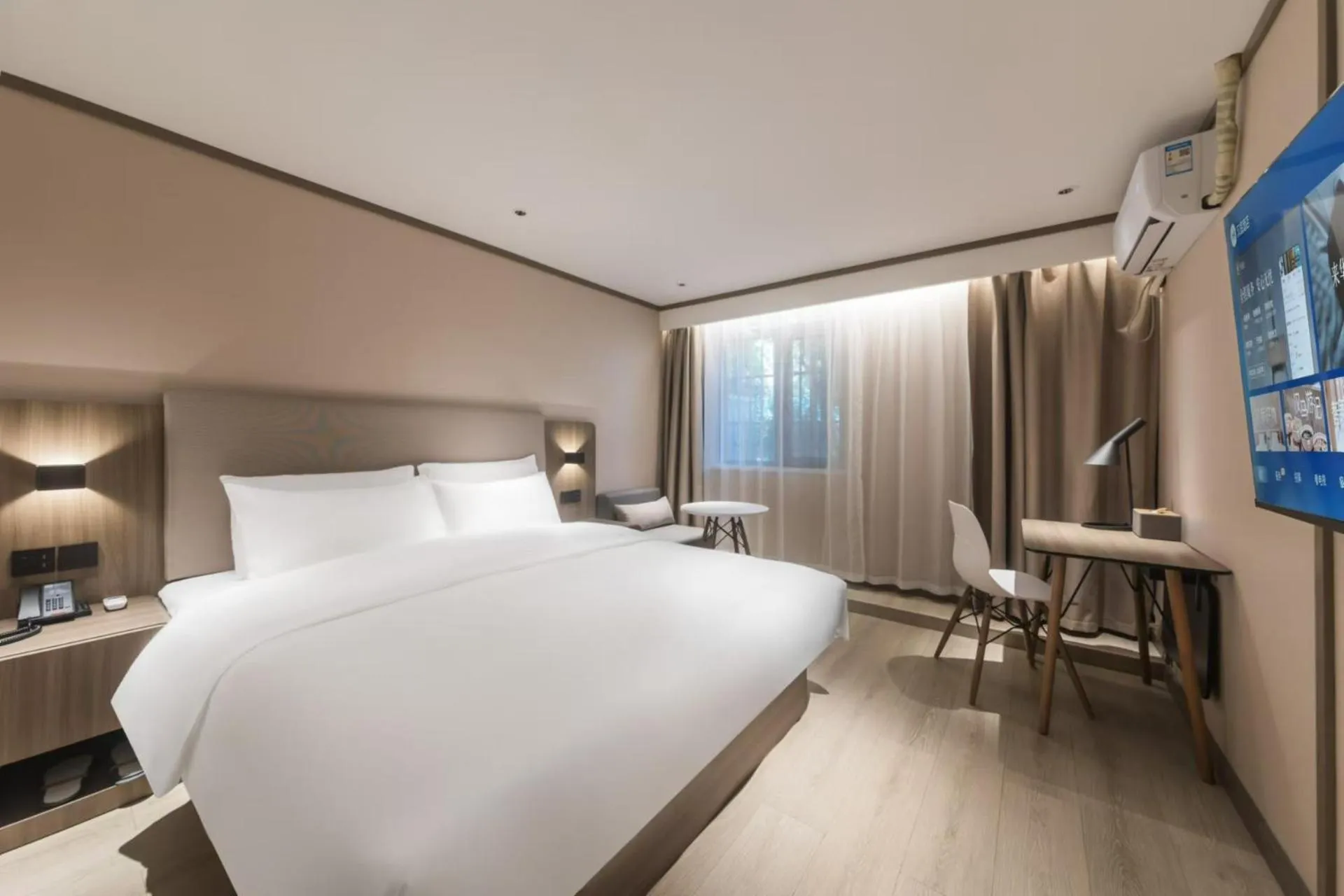 Bed in Hanting Hotel Nanjing Jiangpu Longhua Road Subway Station