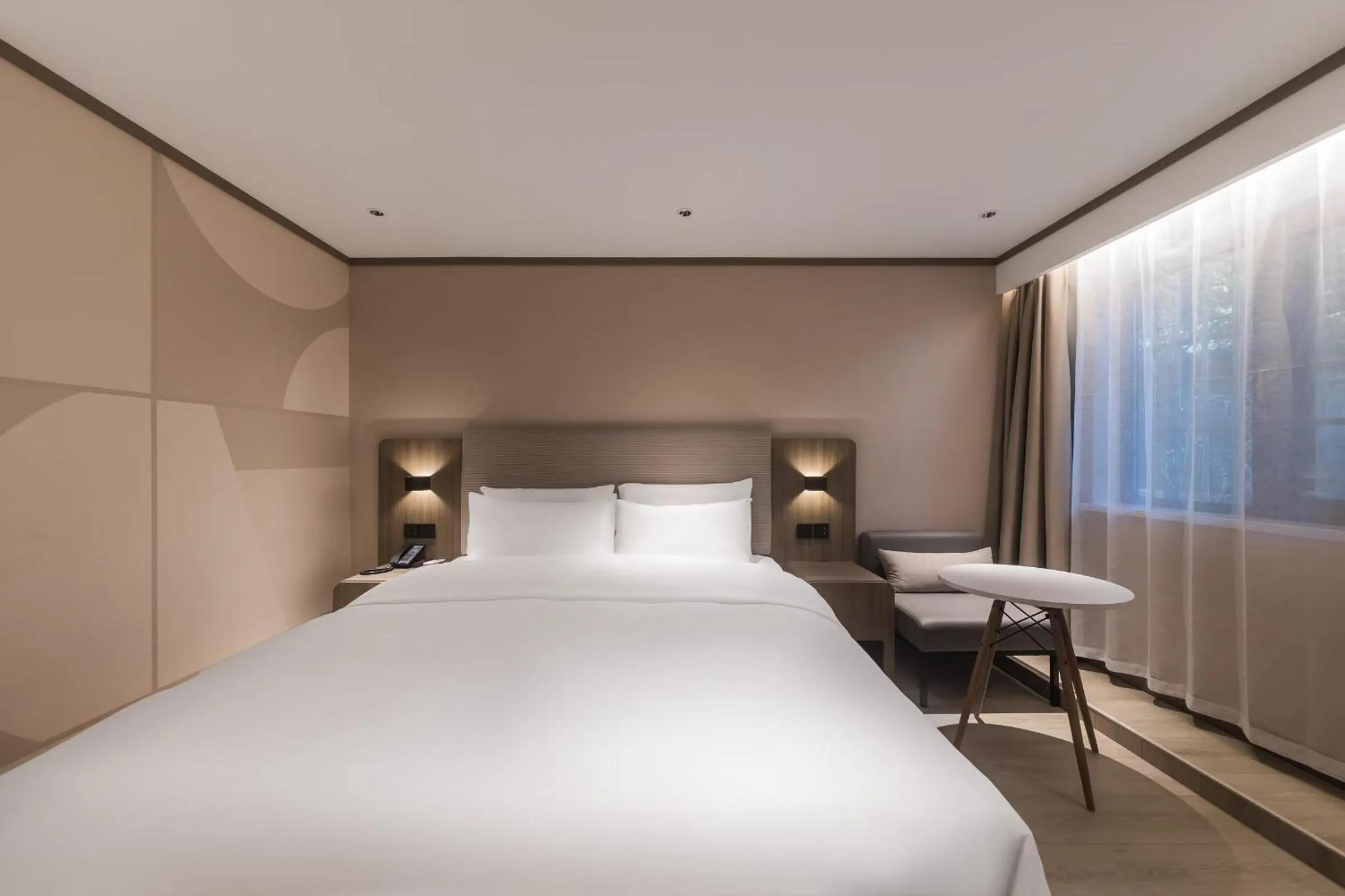 Bed in Hanting Hotel Nanjing Jiangpu Longhua Road Subway Station