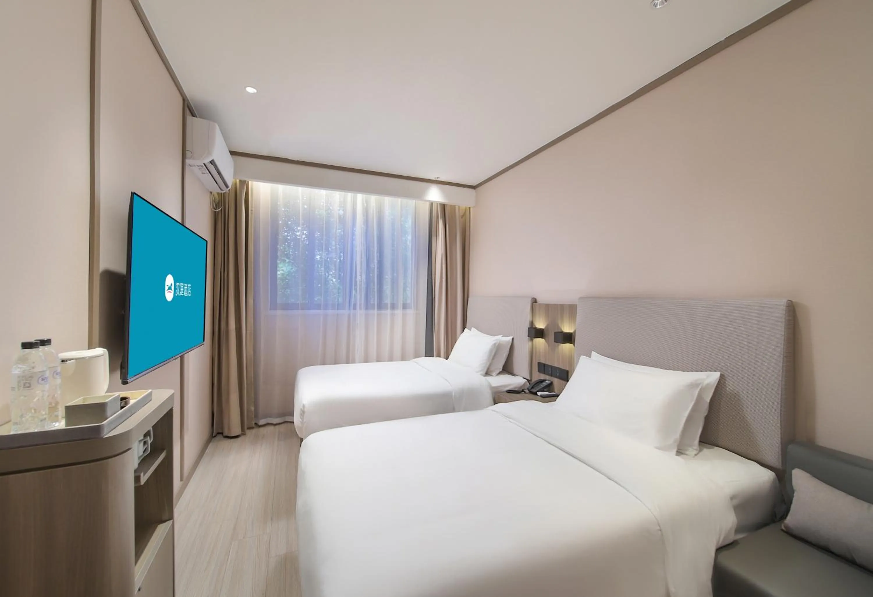 Bed in Hanting Hotel Nanjing Jiangpu Longhua Road Subway Station