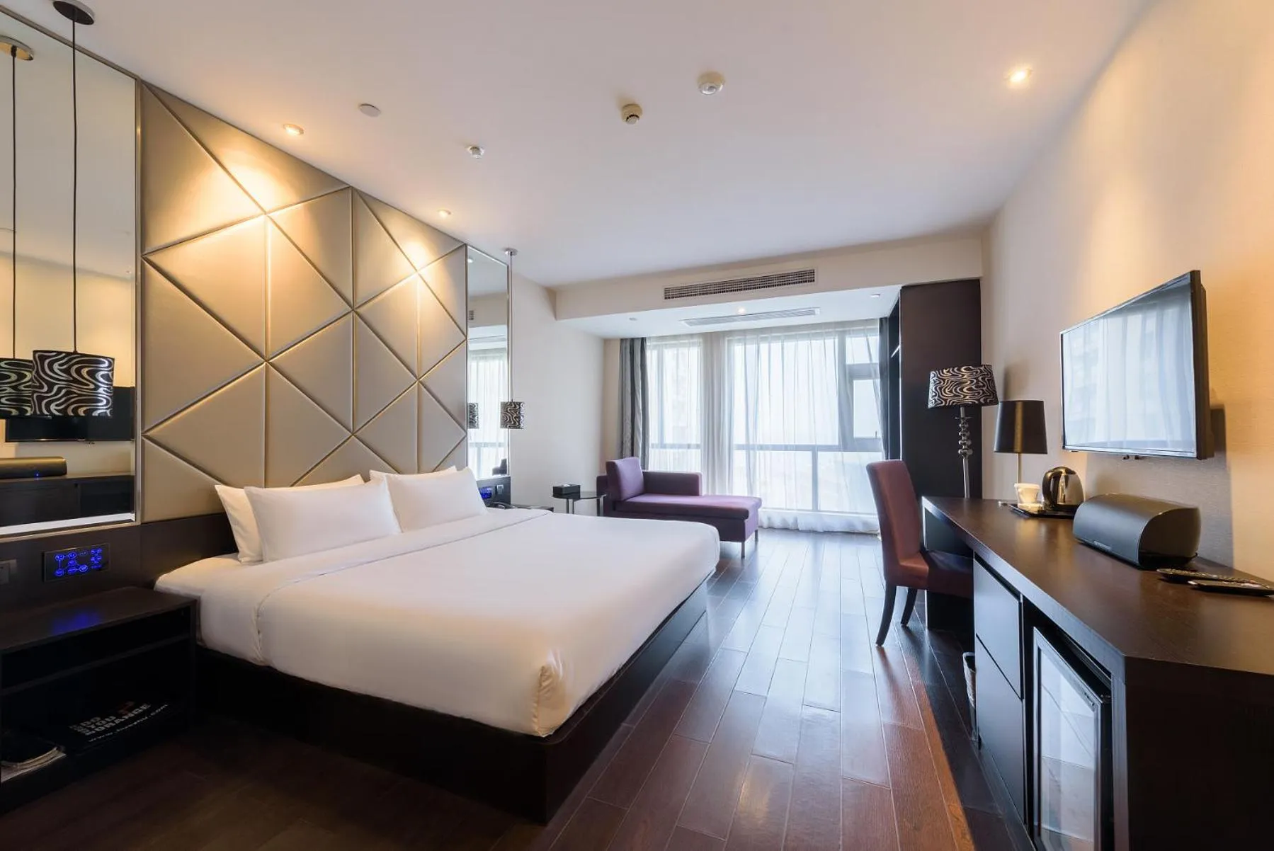 Bed in Orange Hotel Hangzhou Jiubao Passenger Transport Center