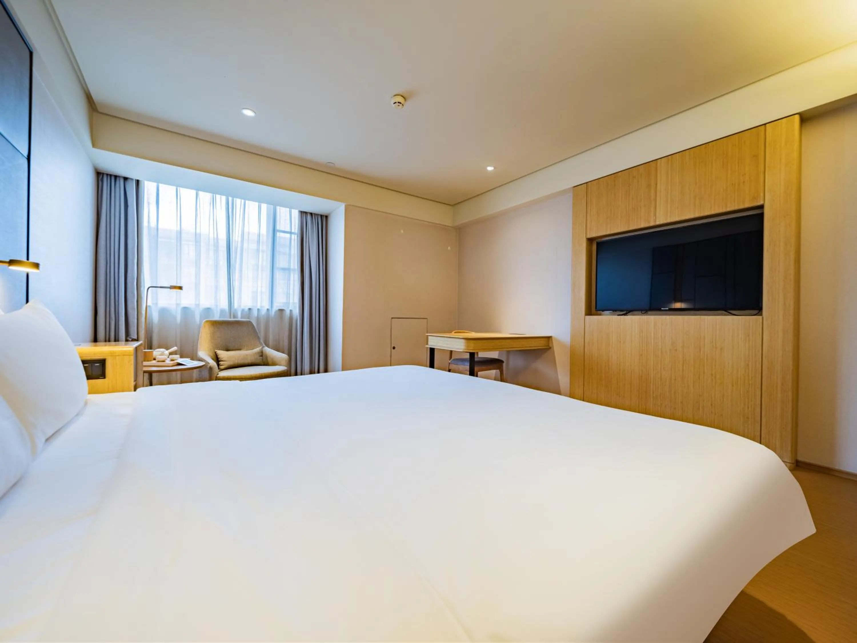 Bed in JI Hotel Chengdu Shuangliu Airport