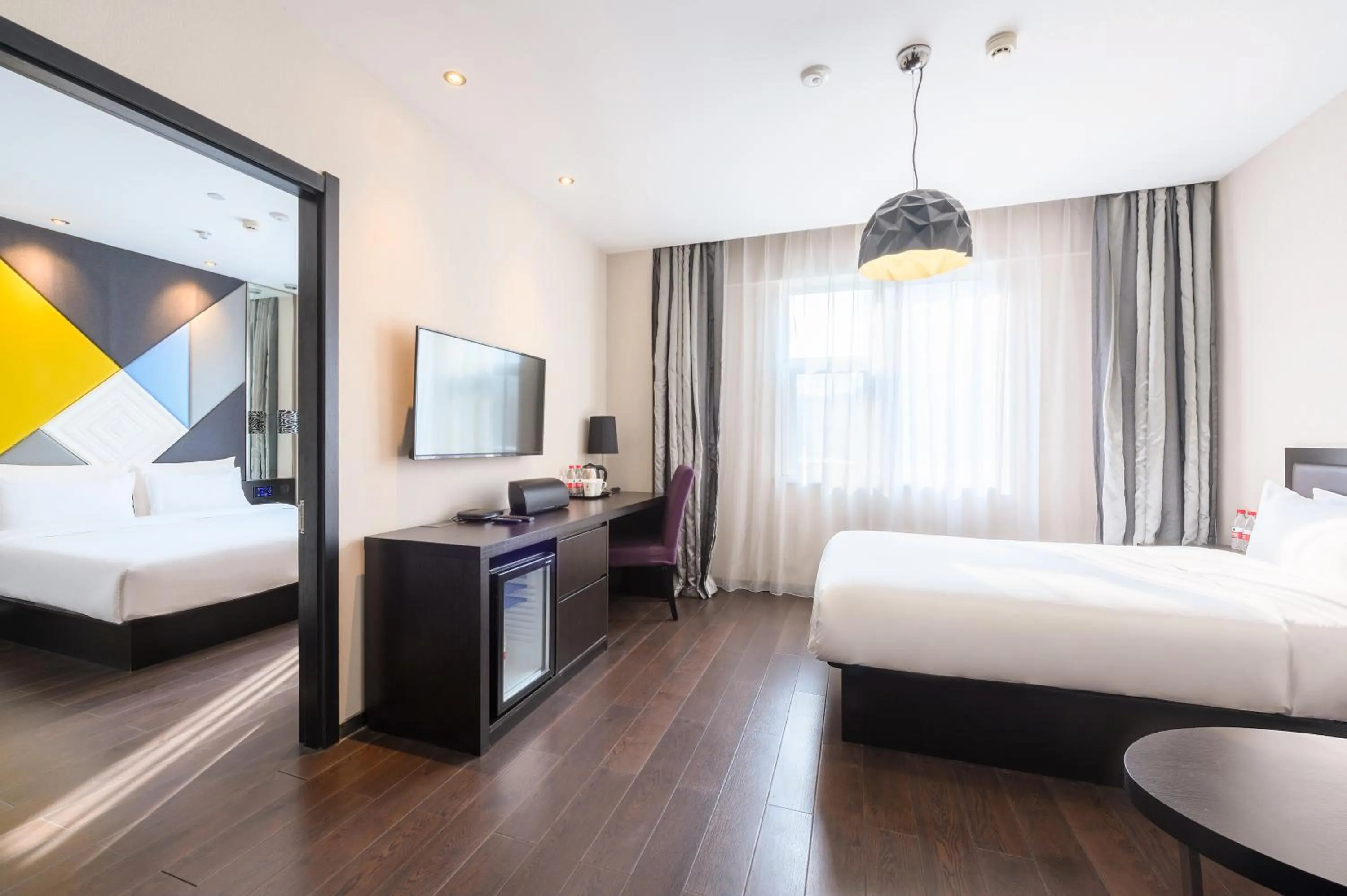 Communal lounge/ TV room, Bed in Orange Hotel Hangzhou Wenyi West Road