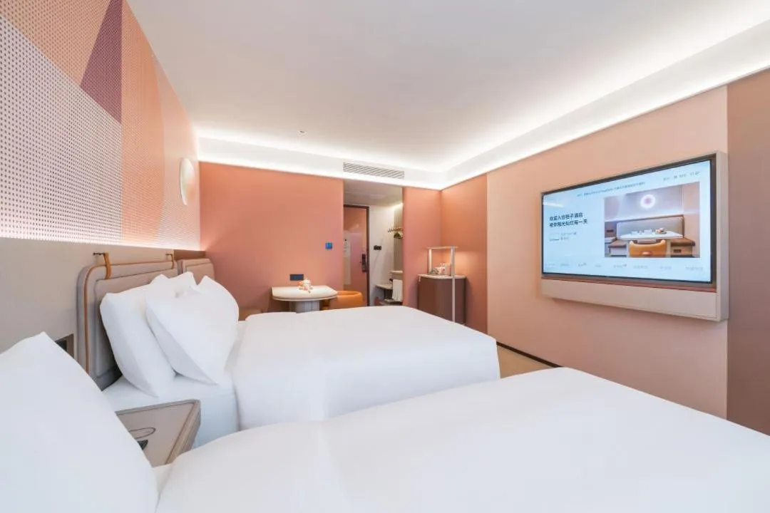 Bed in Orange Hotel Hangzhou West Lake Huanglong Sports Center