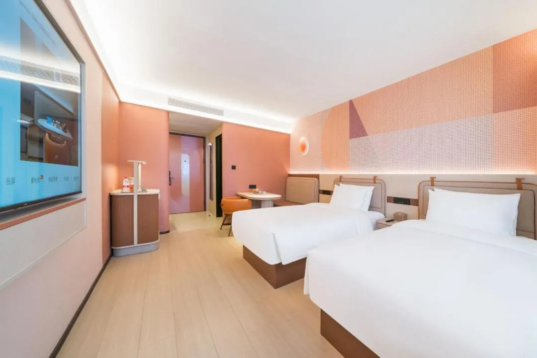 Bed in Orange Hotel Hangzhou West Lake Huanglong Sports Center