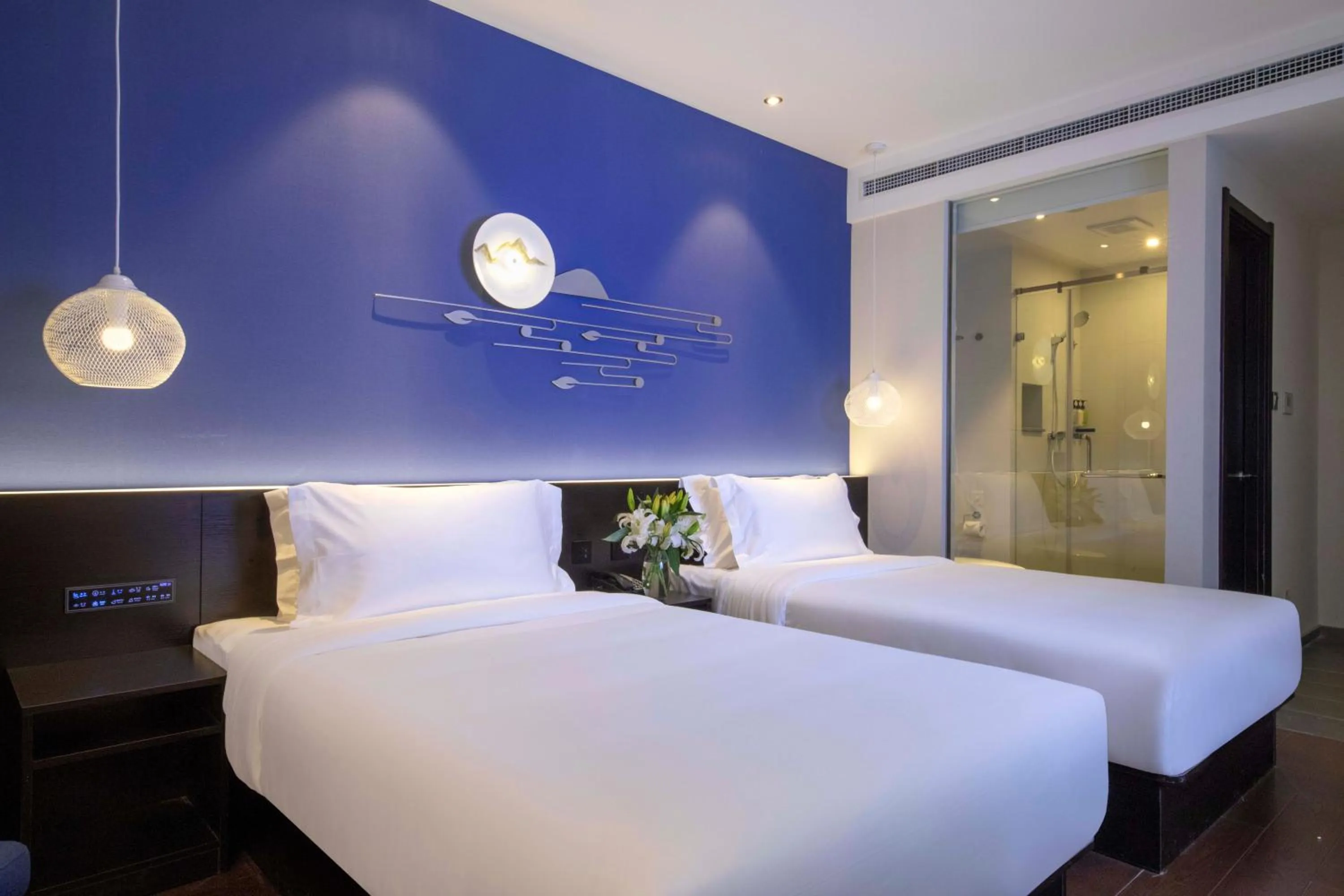 Bed in Orange Hotel Shanghai Hongqiao Railway Station Qixin Road (formerly Hongqiao National Exhibition and Convention Center Qixin Road Branch)