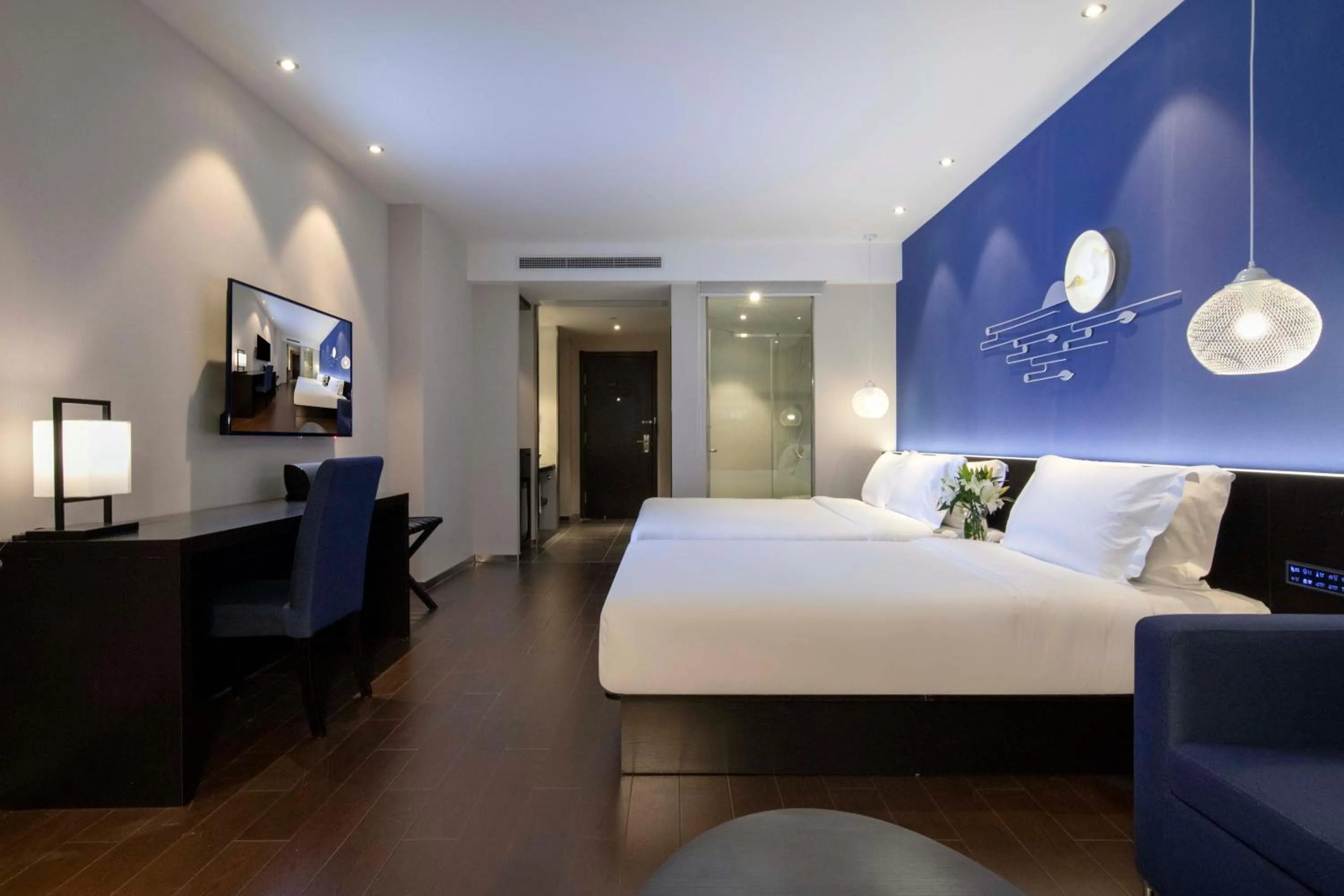 Bed in Orange Hotel Shanghai Hongqiao Railway Station Qixin Road (formerly Hongqiao National Exhibition and Convention Center Qixin Road Branch)