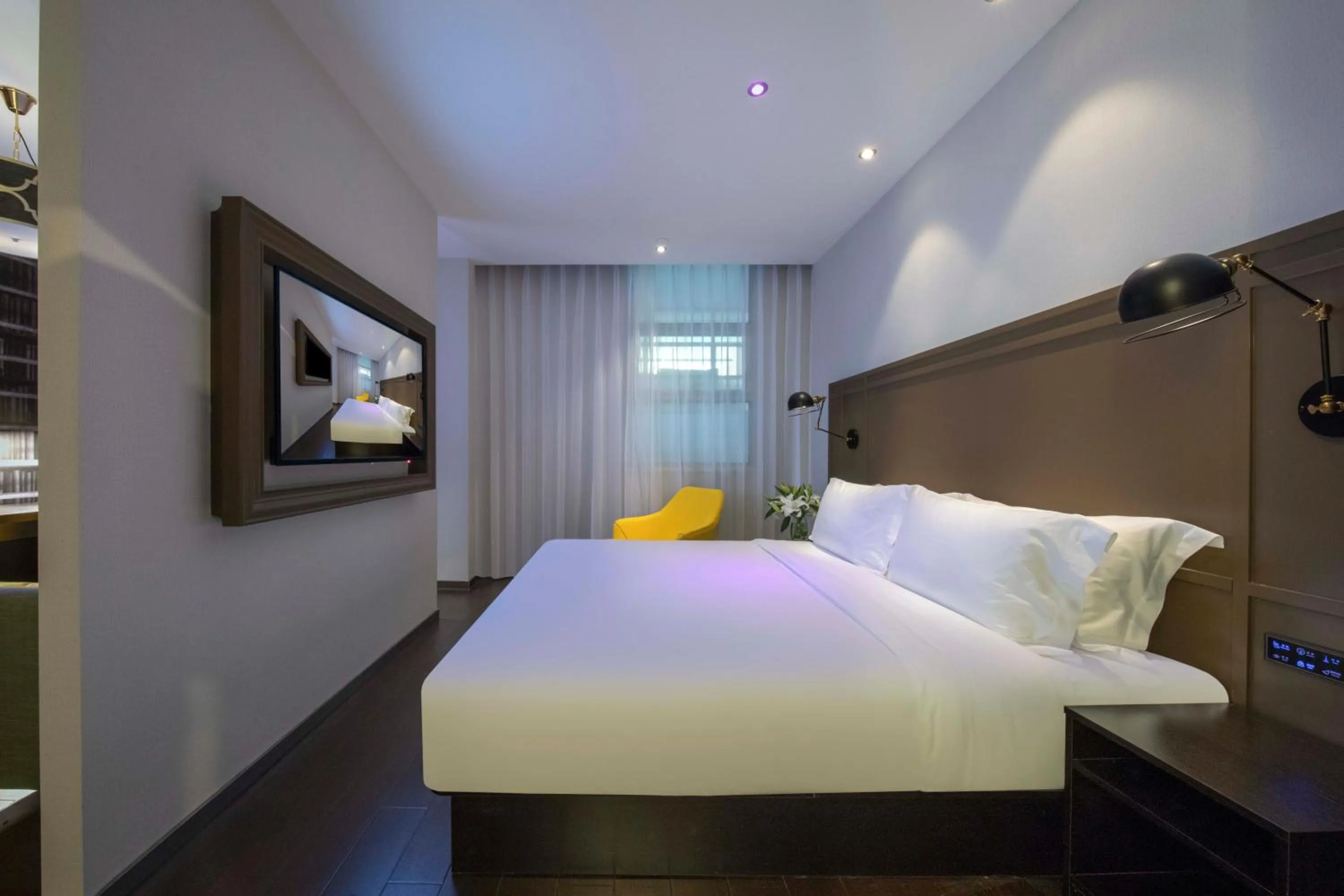 Bed in Orange Hotel Shanghai Hongqiao Railway Station Qixin Road (formerly Hongqiao National Exhibition and Convention Center Qixin Road Branch)
