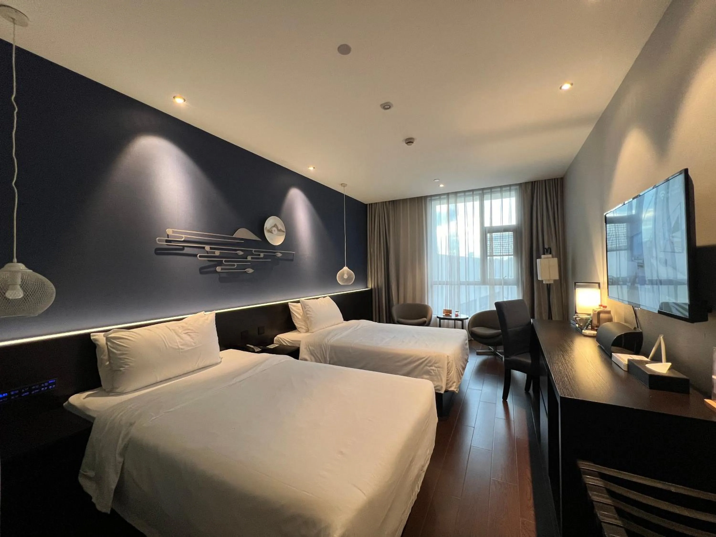 Photo of the whole room, Bed in Orange Hotel Suzhou North Station Cailian Square