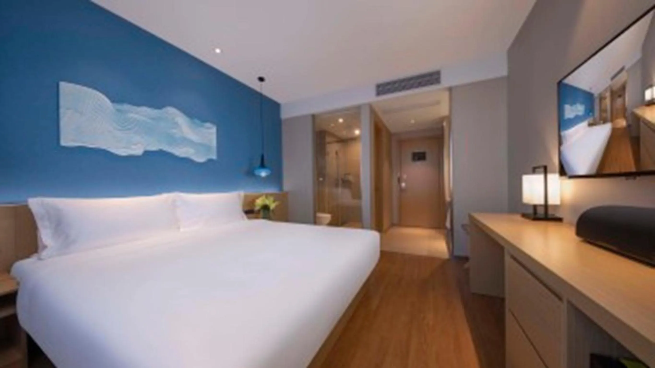Photo of the whole room, Bed in Orange Hotel Suzhou North Station Cailian Square