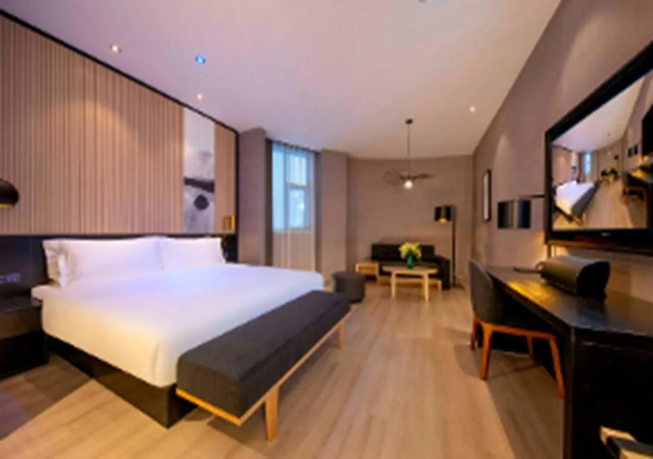 Photo of the whole room, Bed in Orange Hotel Suzhou North Station Cailian Square