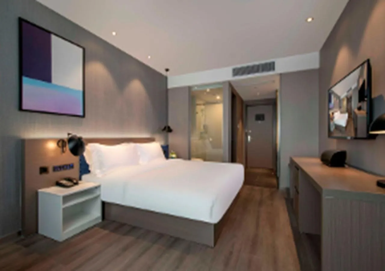 Photo of the whole room, Bed in Orange Hotel Suzhou North Station Cailian Square