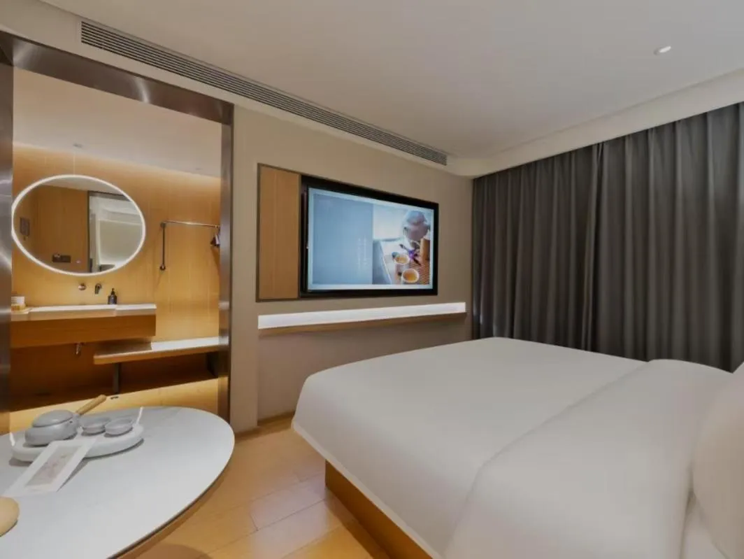 Bed in JI Hotel Beijing South Railway Station Jiaomen West Subway Station