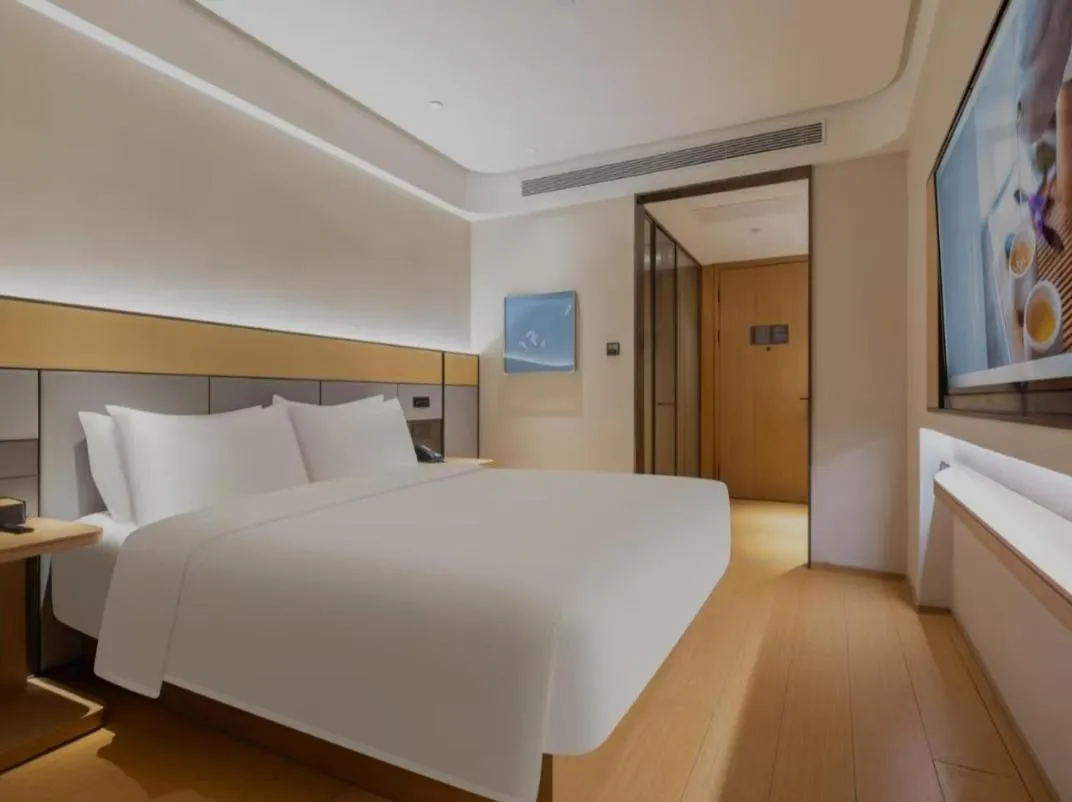 Bed in JI Hotel Beijing South Railway Station Jiaomen West Subway Station