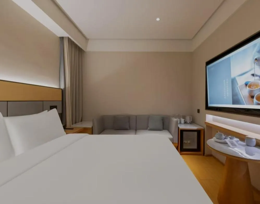 Bed in JI Hotel Beijing South Railway Station Jiaomen West Subway Station