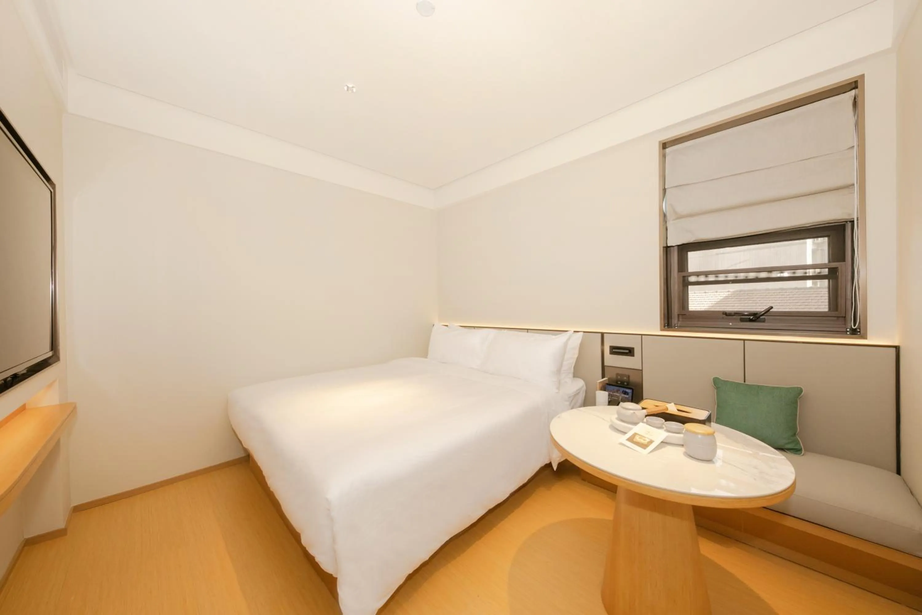 Bed in JI Hotel Beijing International Exhibition Center Sanyuan West Bridge