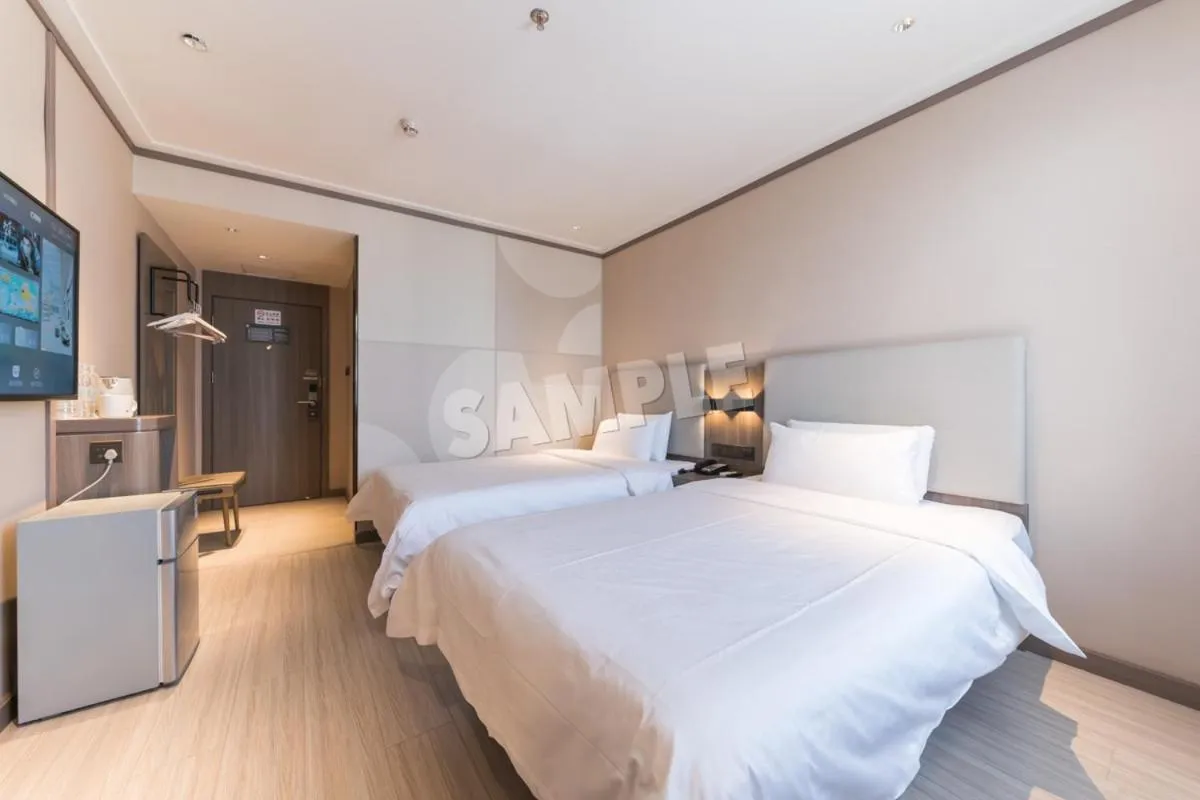 Bed in Hanting Hotel Shenzhen Vanke Yuncheng Xili Subway Station