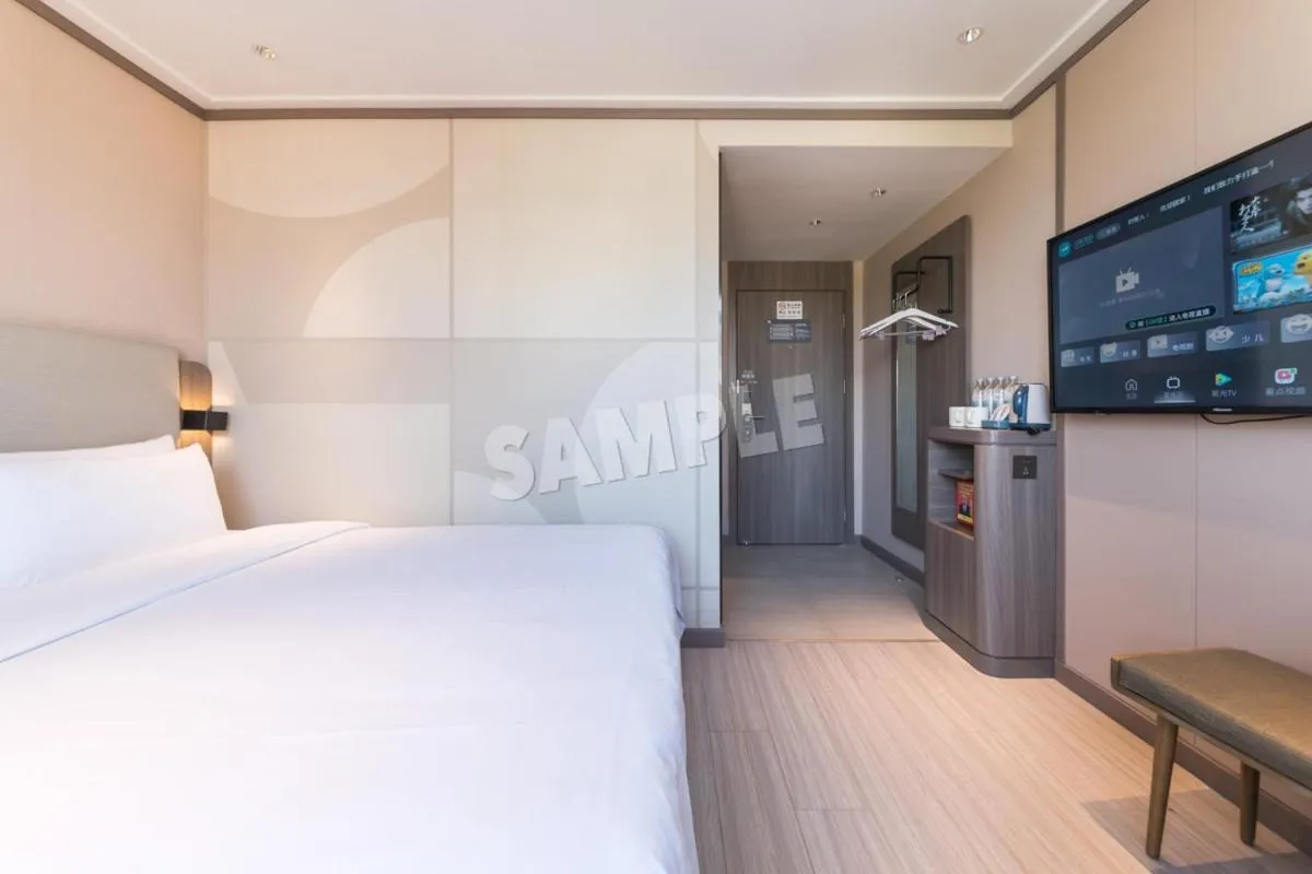Bed in Hanting Hotel Shenzhen Vanke Yuncheng Xili Subway Station