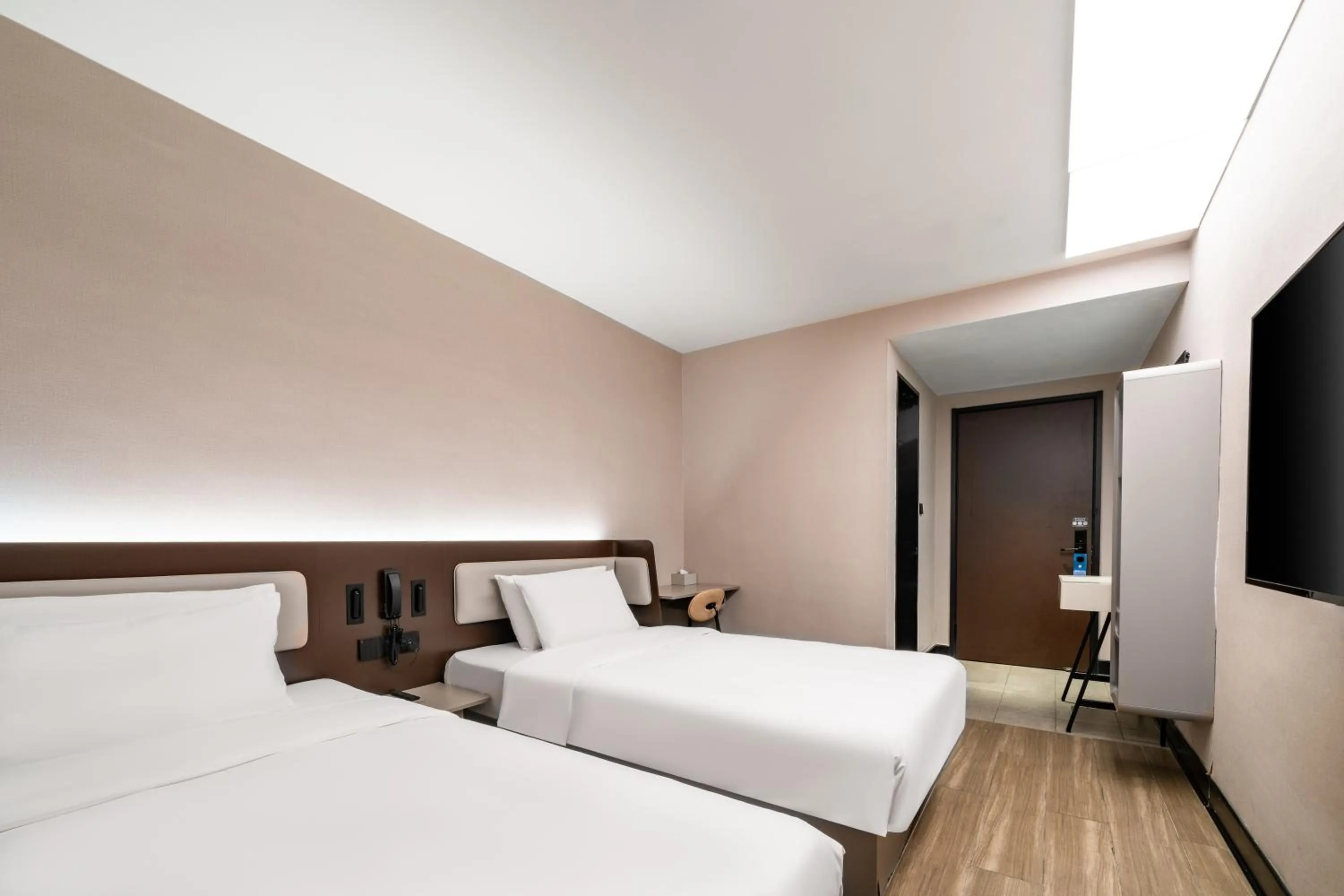 Bed in Hanting Hotel Shenzhen Coast City Nanyou Clothing City