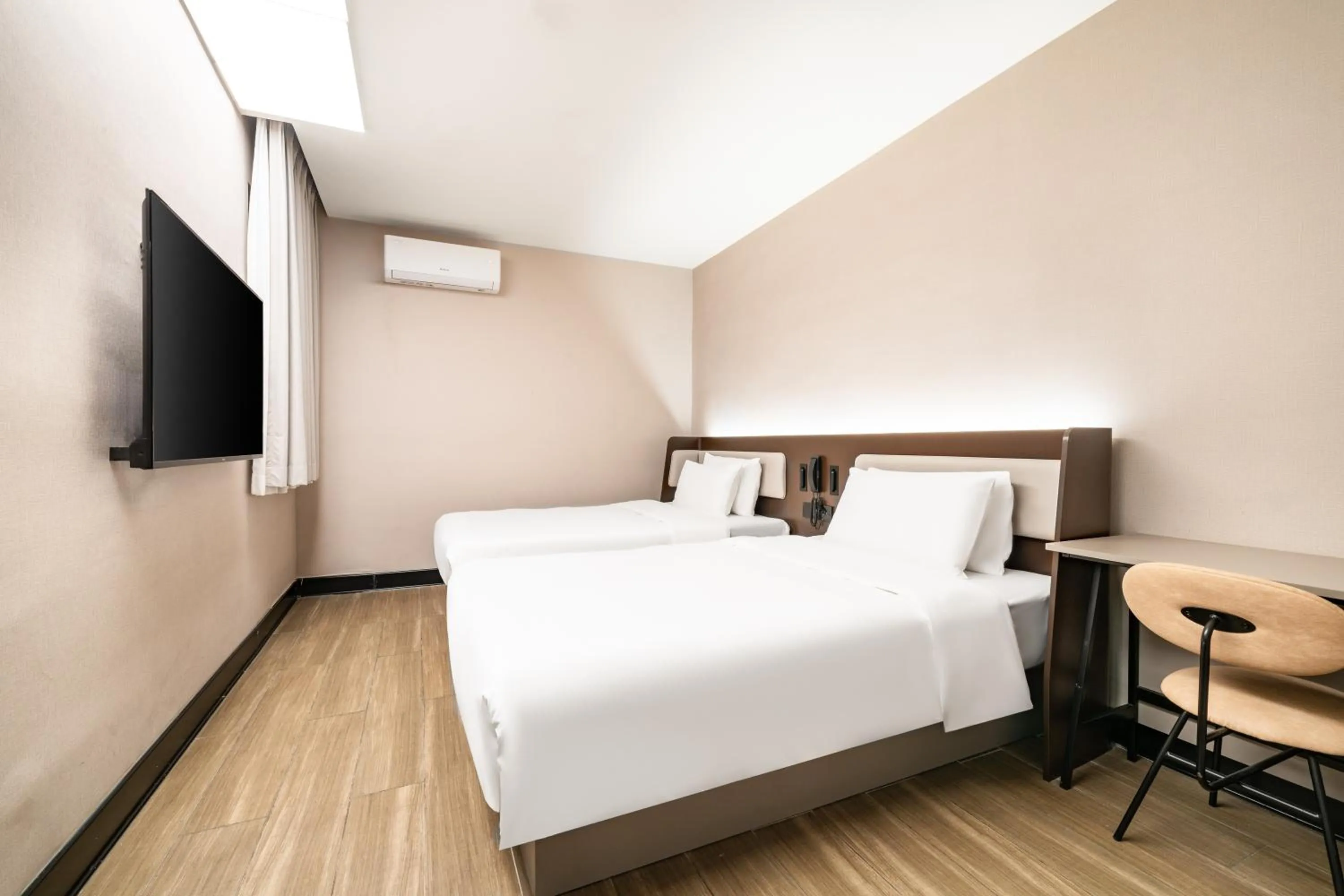Bed in Hanting Hotel Shenzhen Coast City Nanyou Clothing City