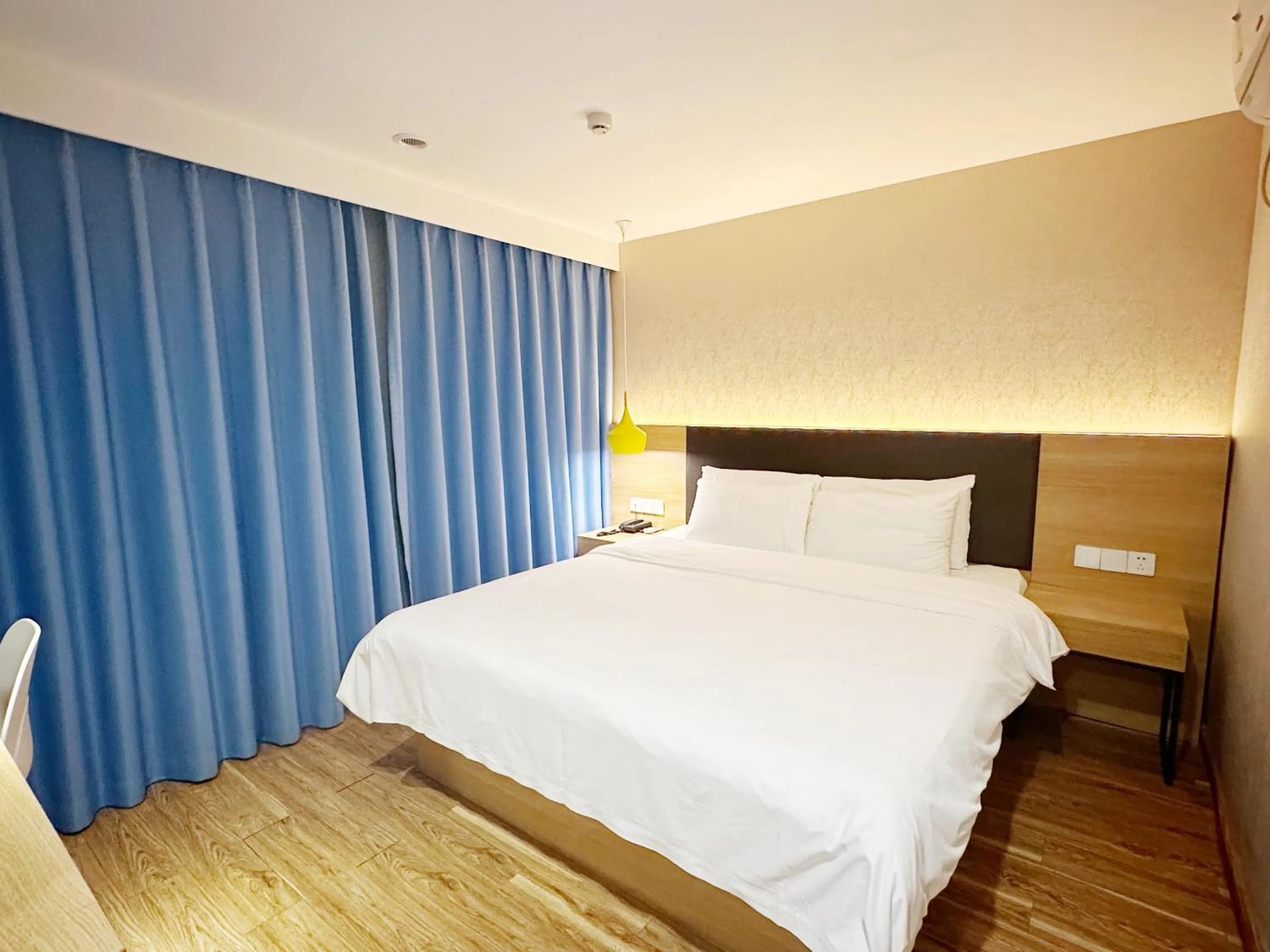 Bed in Hanting Hotel Guangzhou Feixiang Park Subway Station