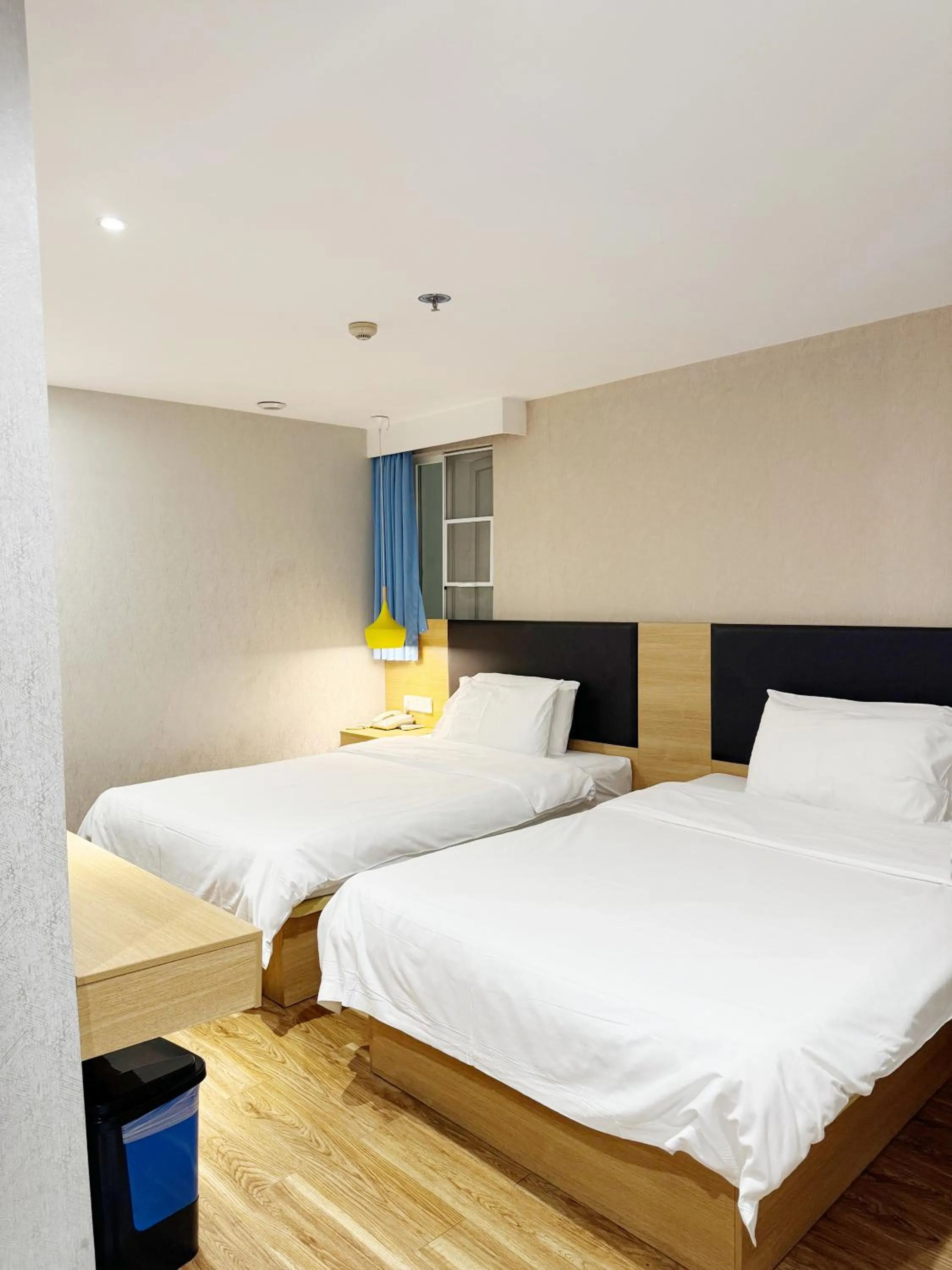 Bed in Hanting Hotel Guangzhou Feixiang Park Subway Station