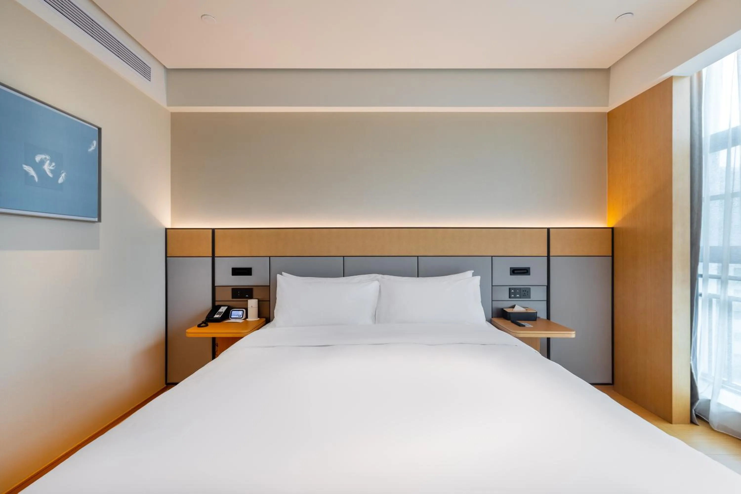 Bed in JI Hotel Nanjing Gaochun Crab City