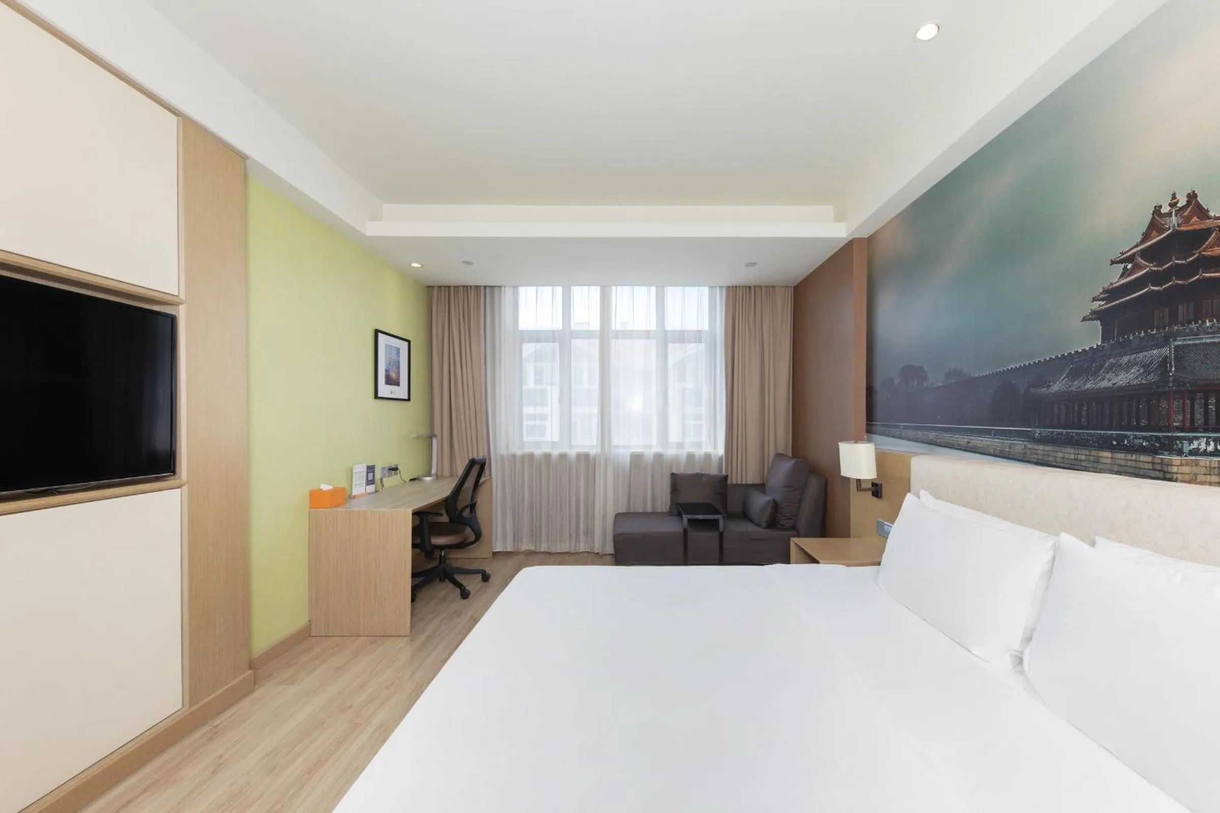 Bed in Orange Hotel Beijing Yizhuang Bridge Subway Station