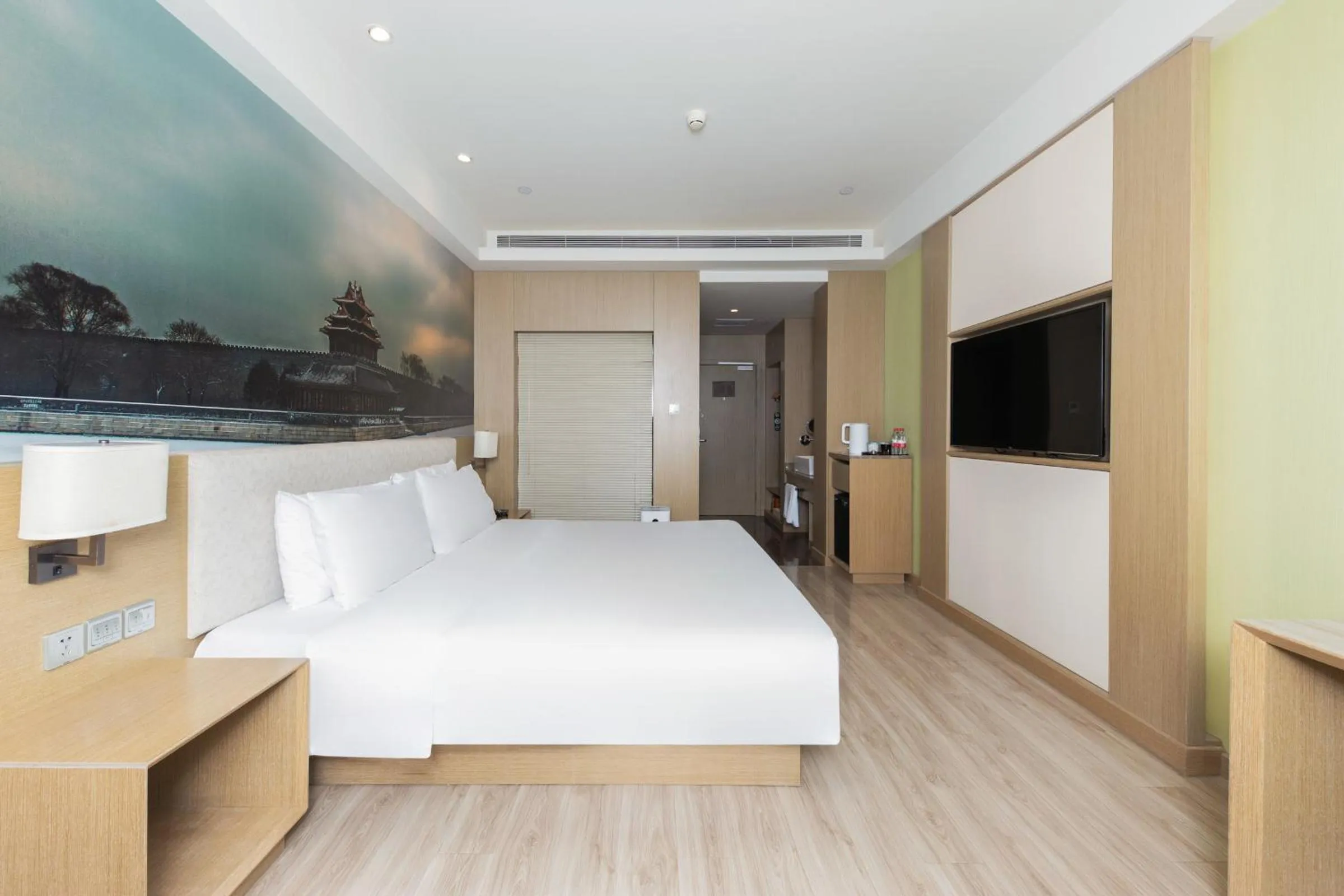 Bed in Orange Hotel Beijing Yizhuang Bridge Subway Station