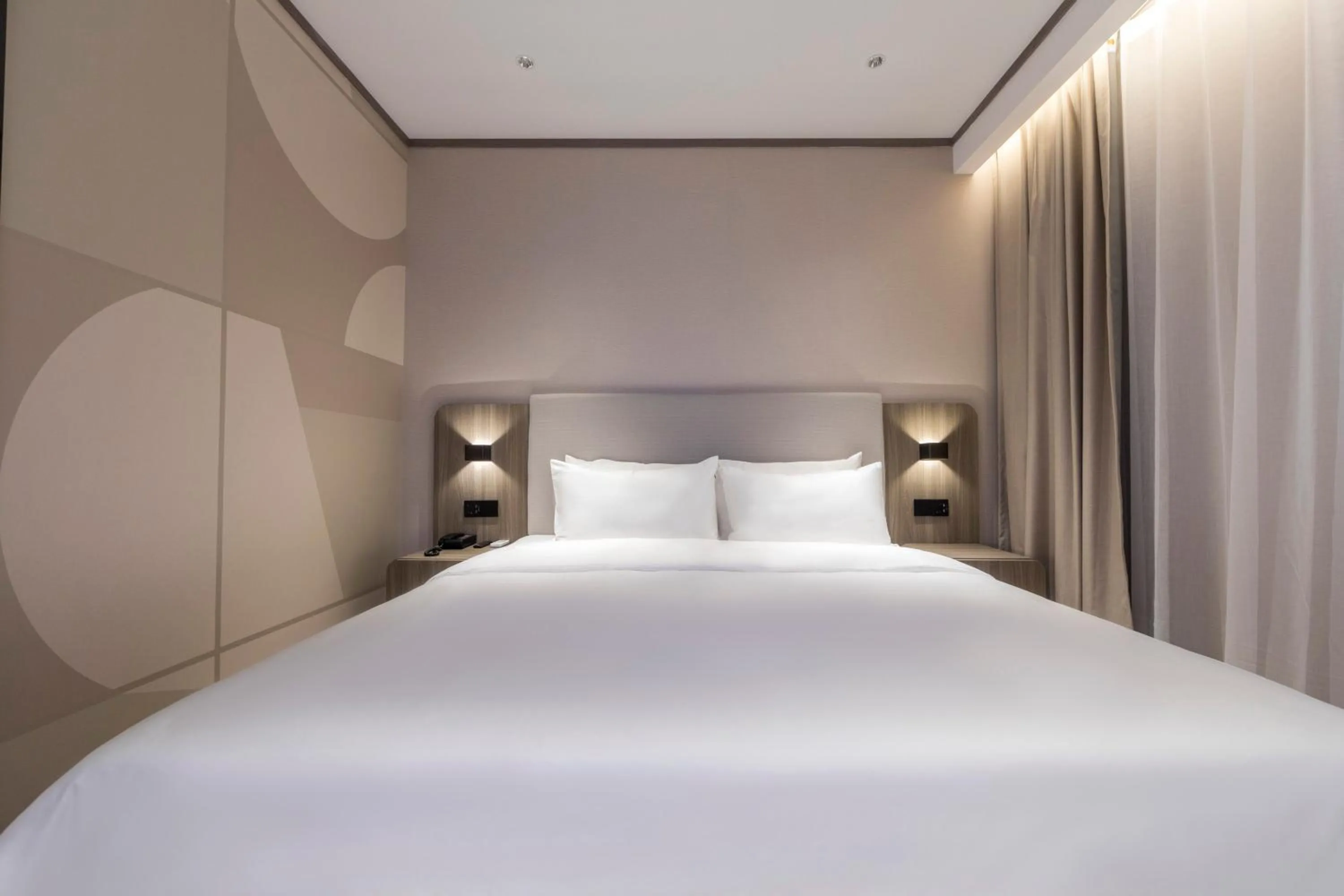 Bed in Hanting Hotel Shanghai South Station East China University of Science and Technology