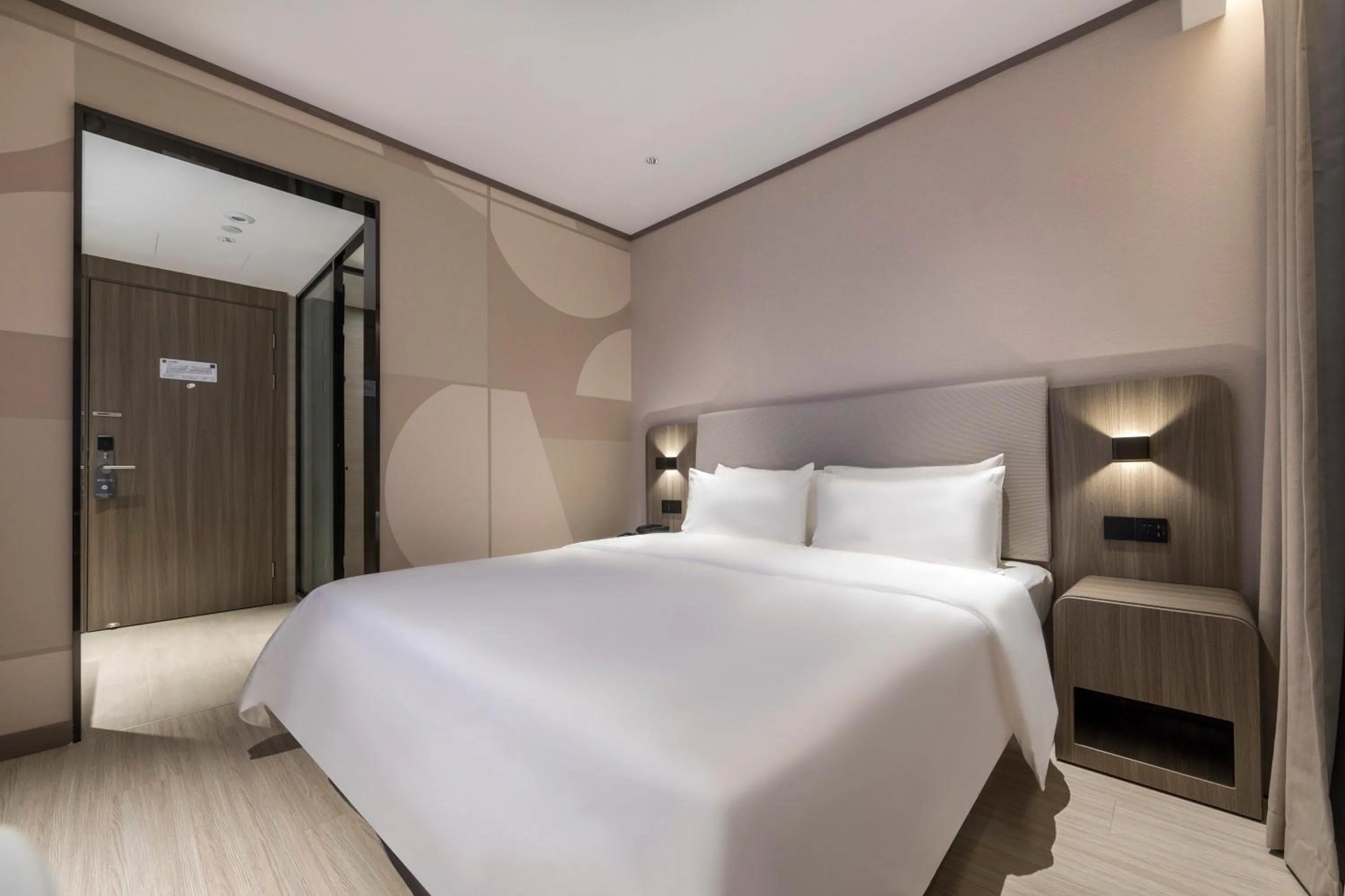 Bed in Hanting Hotel Shanghai South Station East China University of Science and Technology