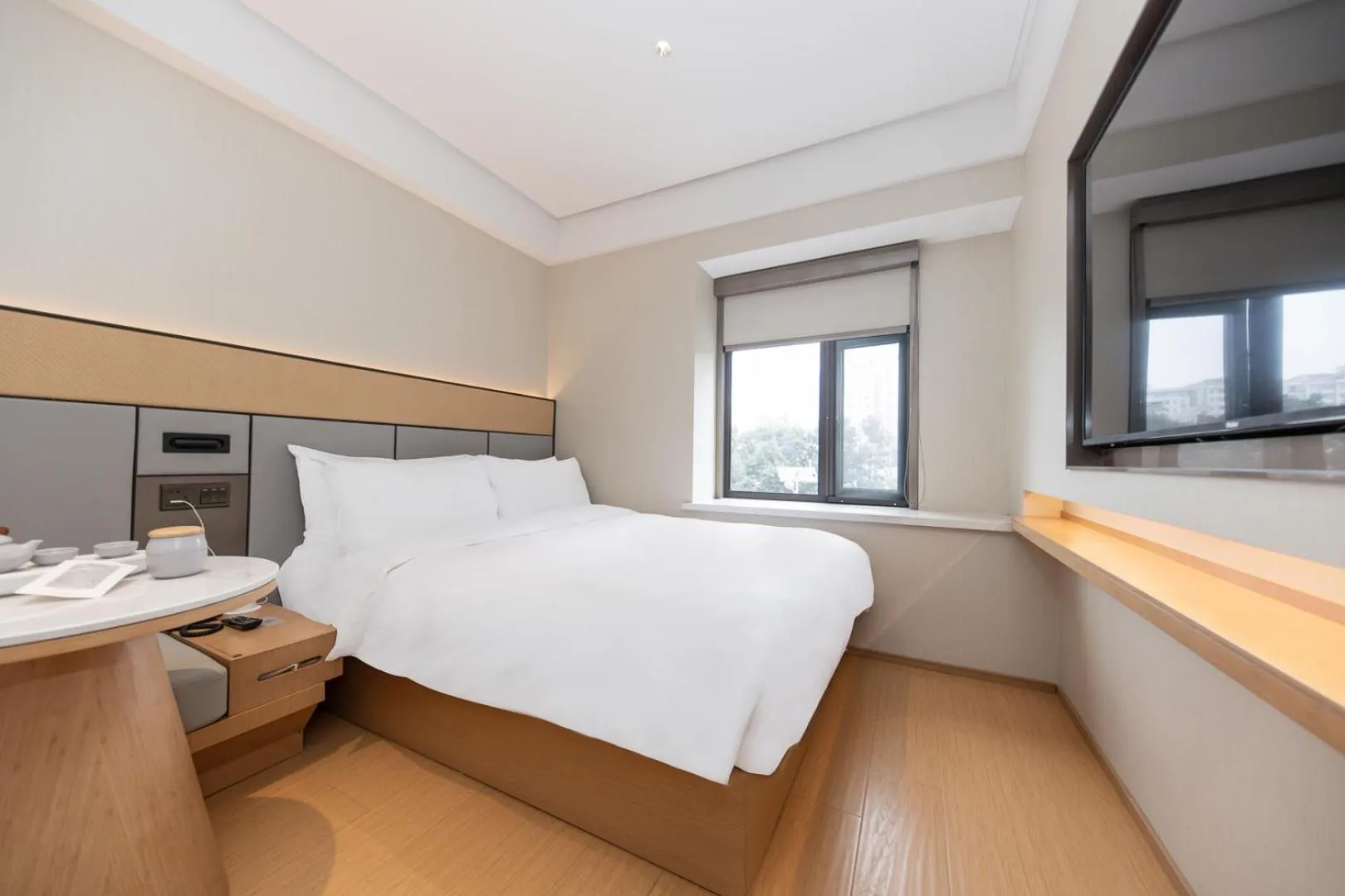 Bed in JI Hotel Shanghai Xinzhuang Qixin Road Qixin Road